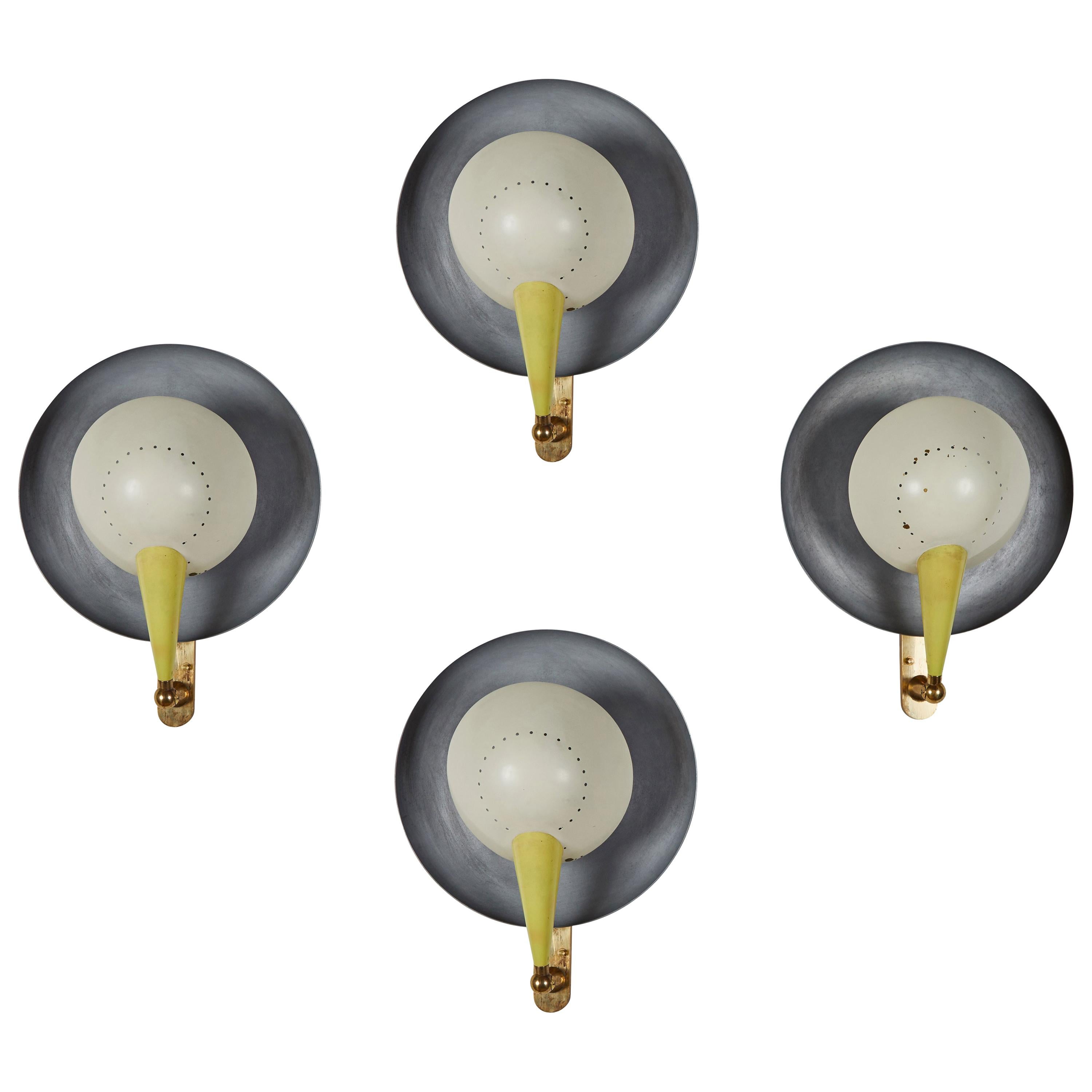 Aluminum and brass. Rewired for US junction boxes. Adjustable shades. Each light takes one E27 75w maximum bulb. Priced per pair.
Literature: Roberto Aloi, L’ Arredamento Moderno, sesta serie, Milan, 1955, fig. 236 for a similar example Italian