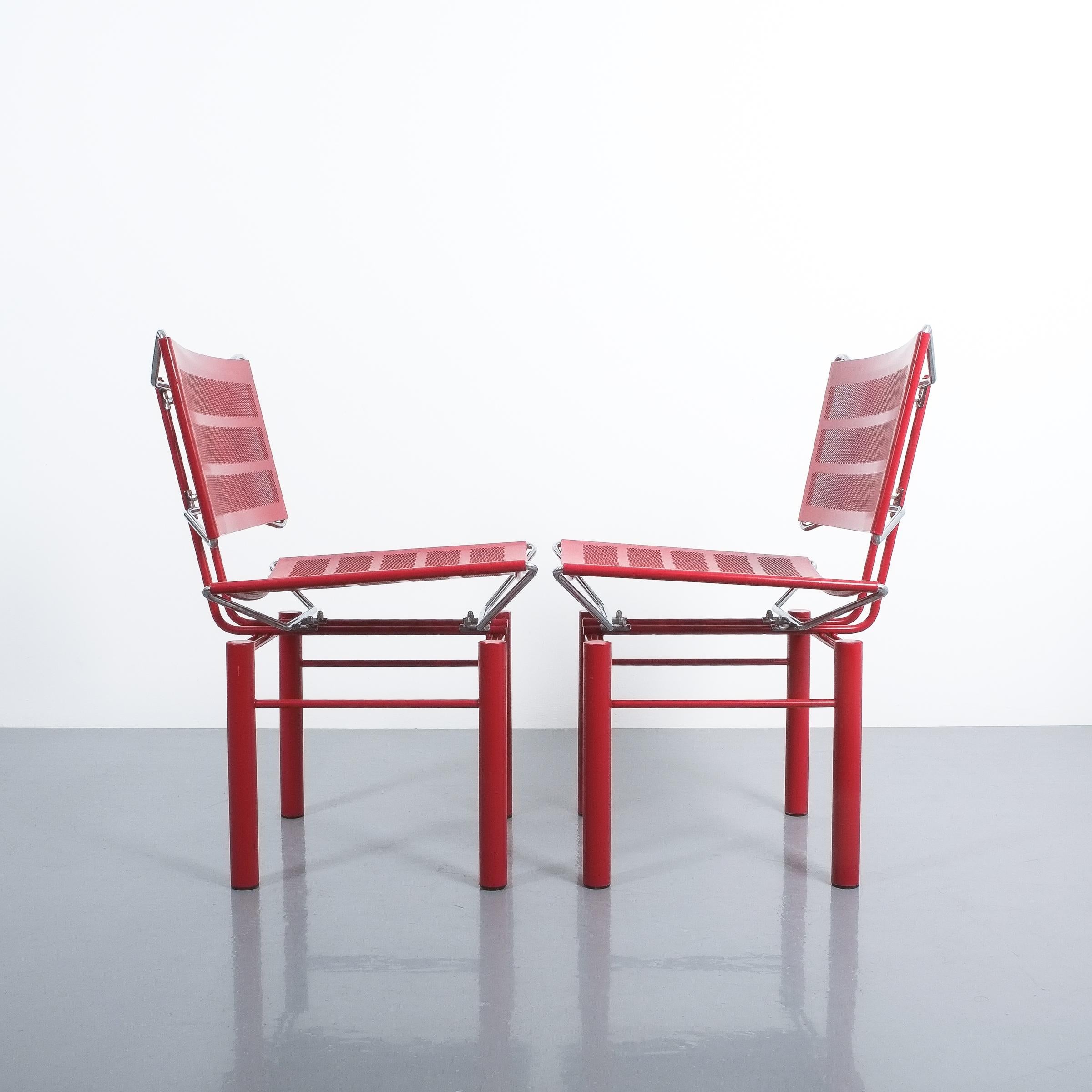 Two pairs of red Hans Ullrich Bitsch chairs Series 8600, circa 1980. Postmodern classic with perforated backrest and seat and highly delicate metal joints. Very good original condition with some minor color losses. 

We sell them as sets of 2. Total