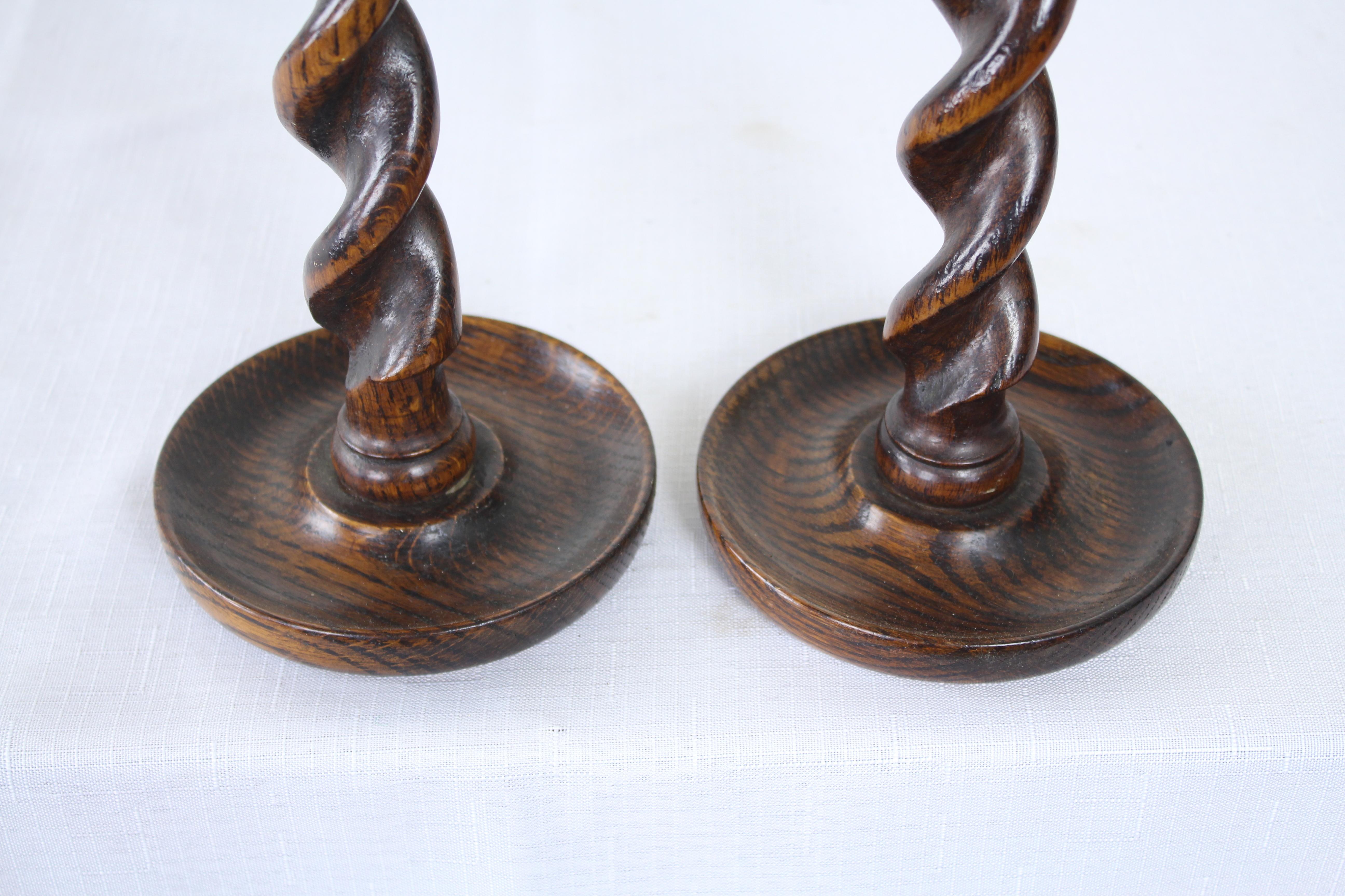 English Two Pairs of Turned Oak Candlesticks