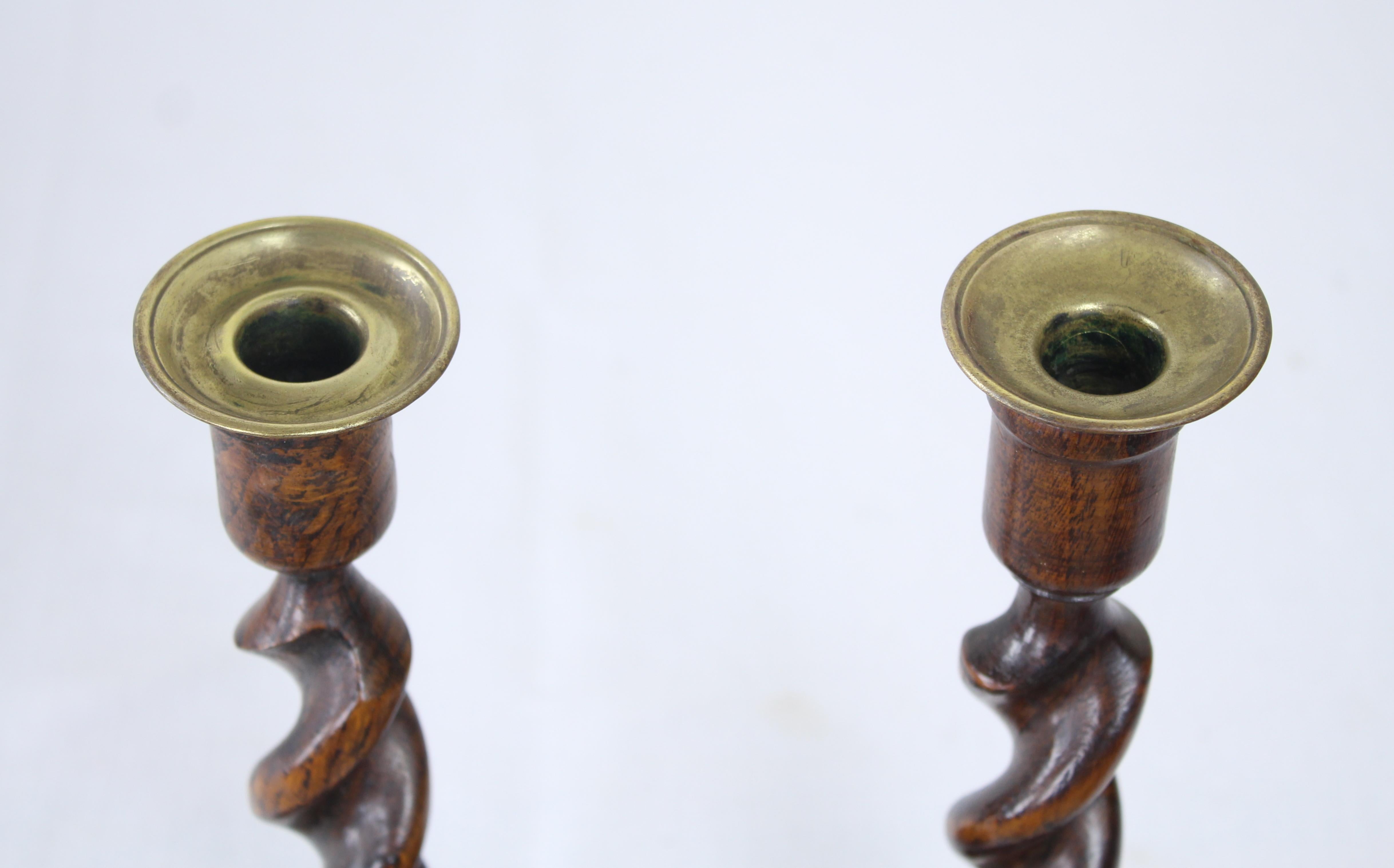 20th Century Two Pairs of Turned Oak Candlesticks