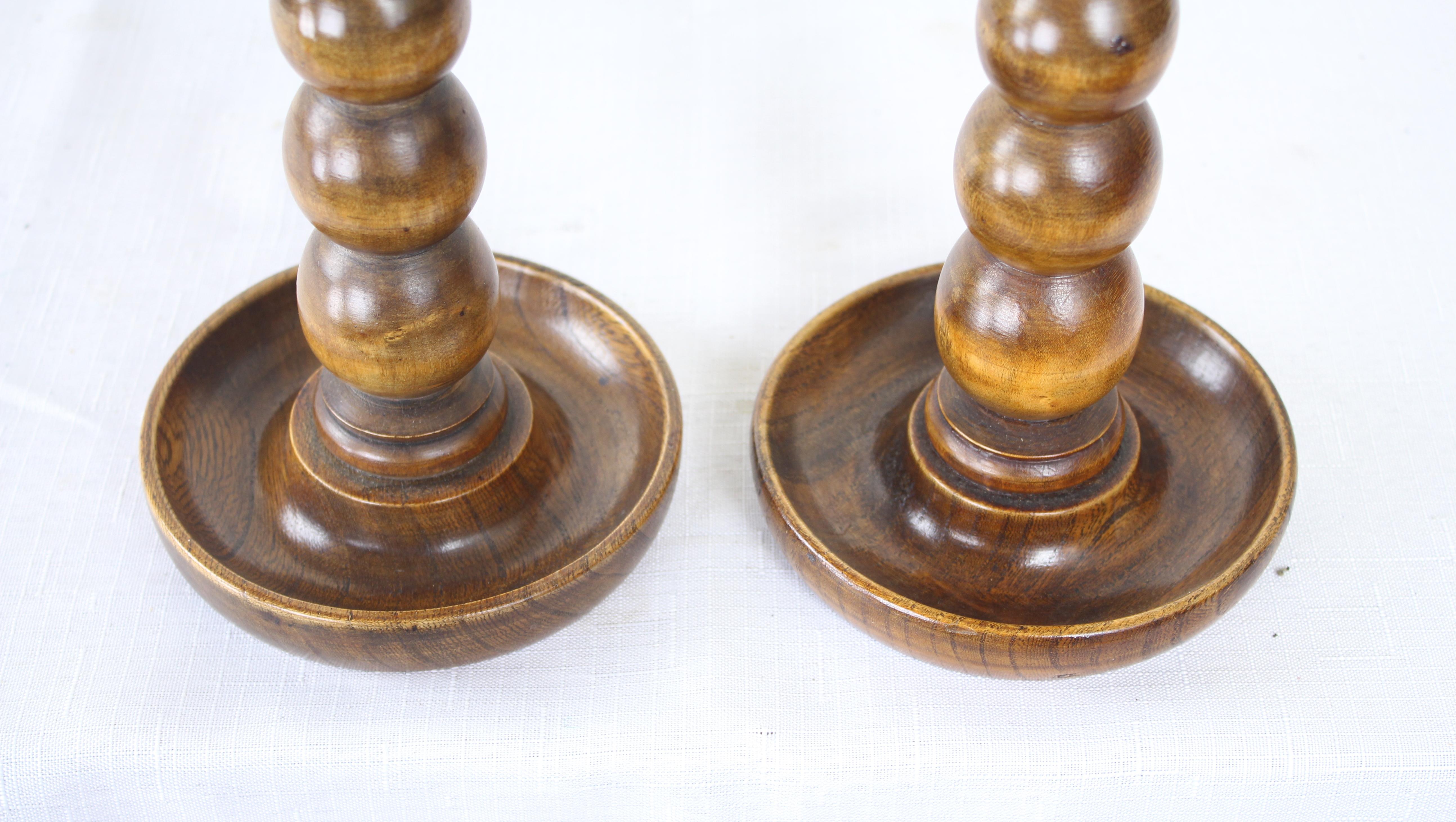 20th Century Two Pairs of Turned Oak Candlesticks For Sale