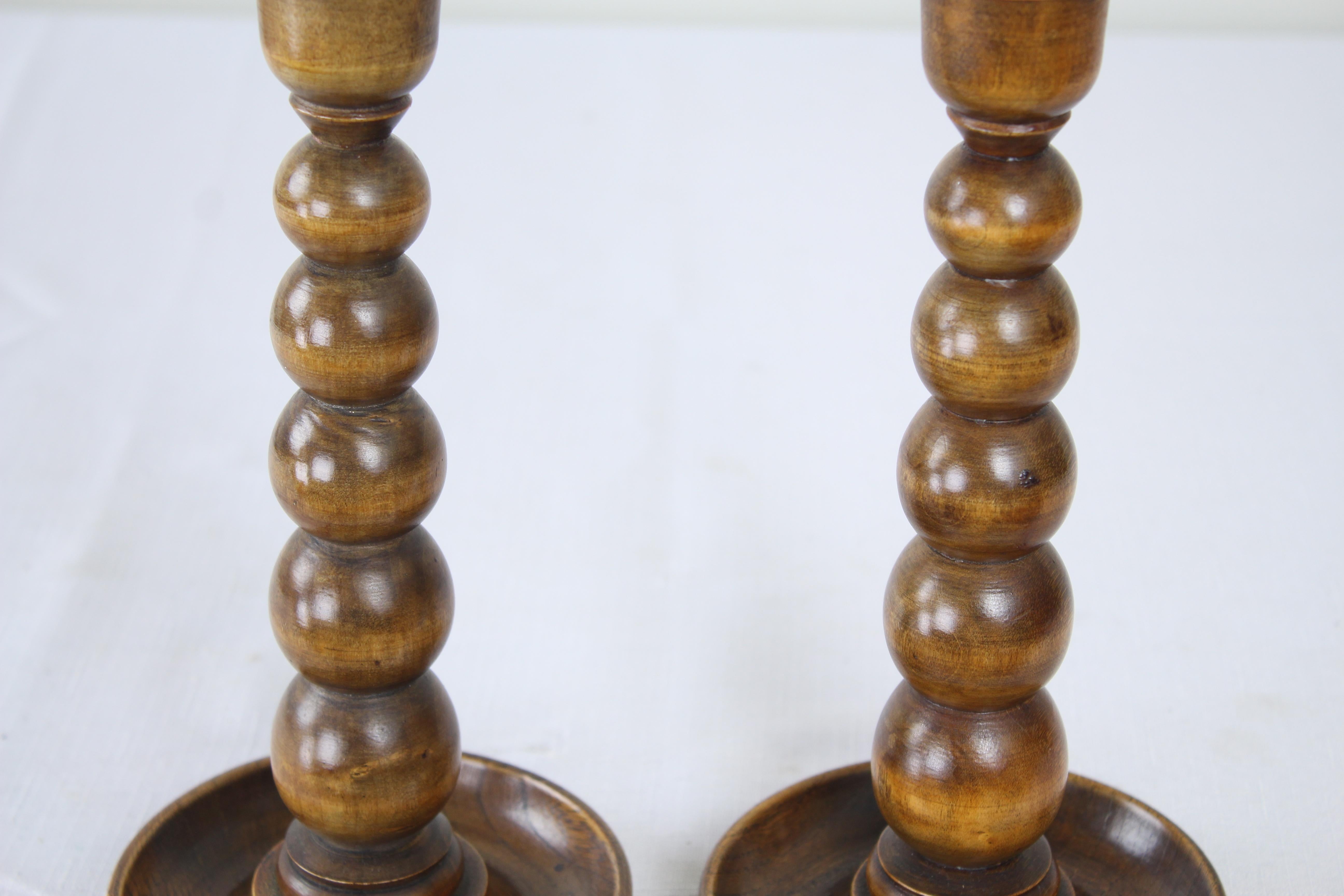 Two Pairs of Turned Oak Candlesticks For Sale 1