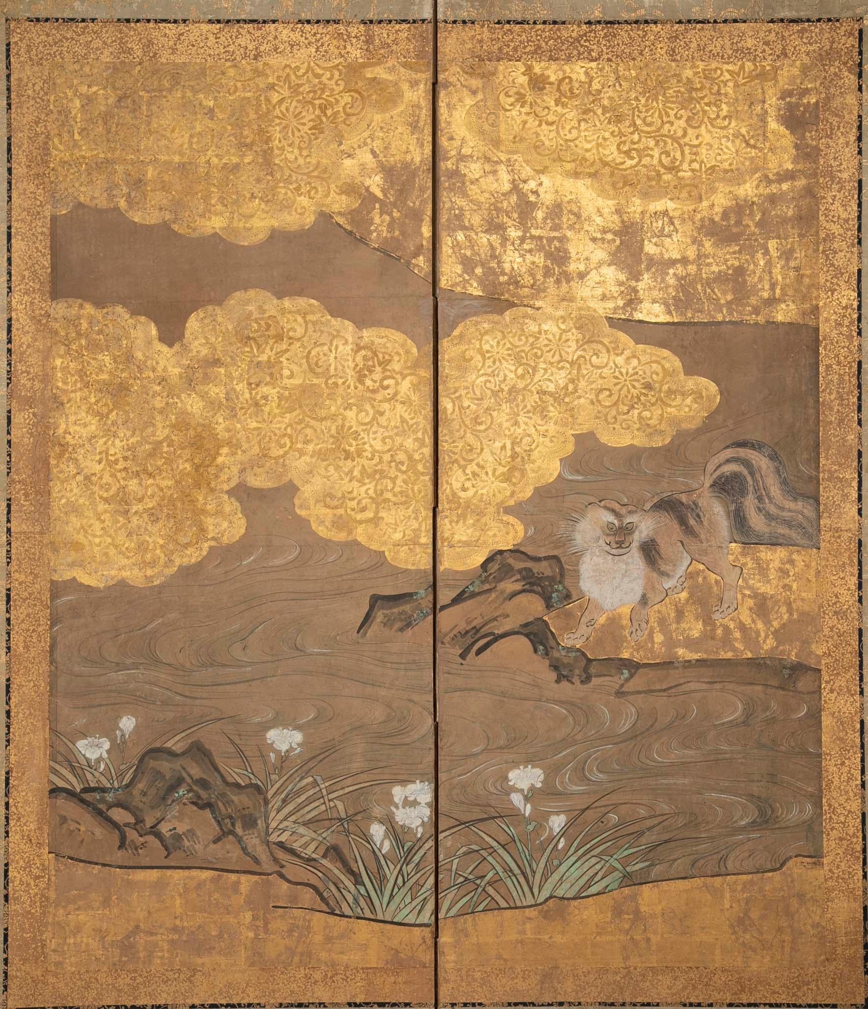 A two-panel screen depicting a musk cat under a cherry tree with gilt decoration. Based on the Kano School, Japanese.