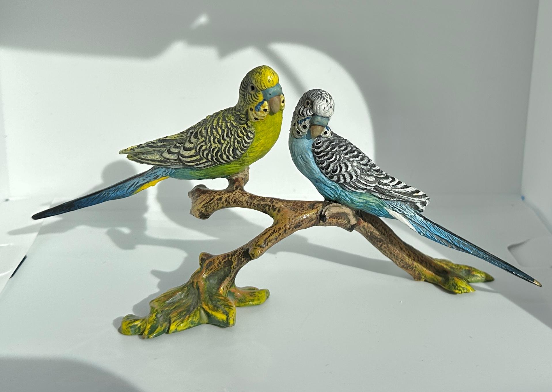THIS IS A SUPERB BERGMAN AUSTRIAN VIENNA BRONZE OF TWO PARAKEET BIRDS ON A BRANCH.
This wonderful antique Austrian Vienna Bronze (Bronze de Vienne, Wiener Bronze, Cold Painted Bronze) is so charming with its yellow-green and blue parakeet birds. 