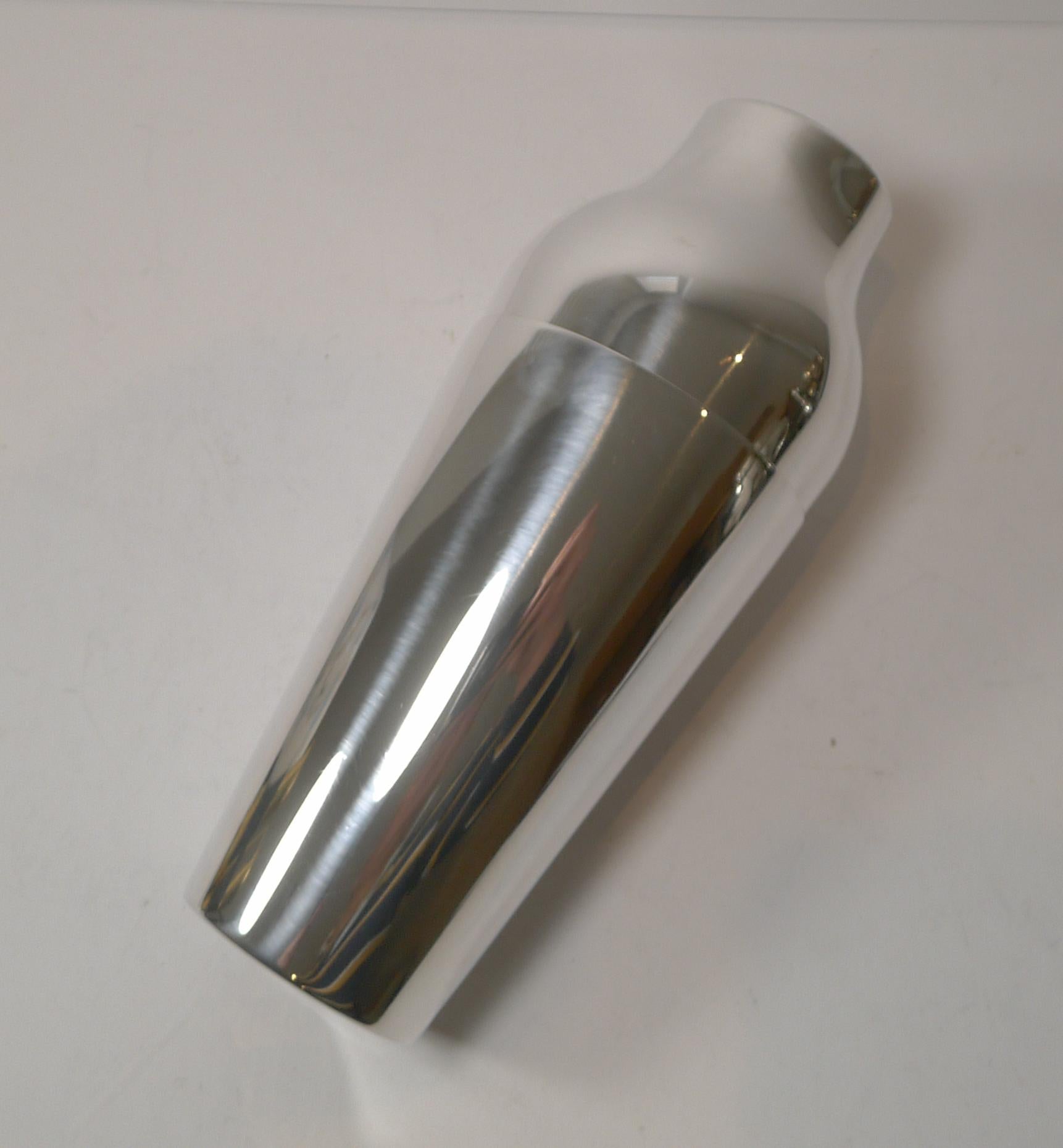 A smart Bauhaus style two-part cocktail shaker with it's sleek modernist design in silver plate.

Made by the top-notch Parisian silversmith, Christofle of Paris, signed on both pieces.

Dating to c.1960 it remains in superb condition having