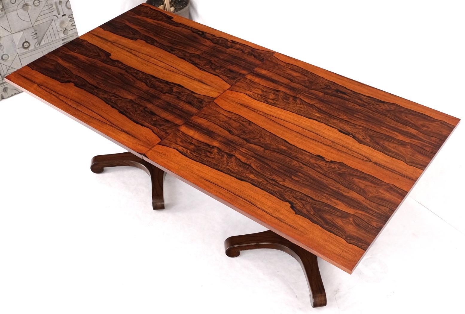 Two part rosewood two pedestals dining table game table mint.
Dining table consisting of two came cafe tables that look together to form one dining table and can be used separately. Mint vintage refinished condition. Extended measurement reads: