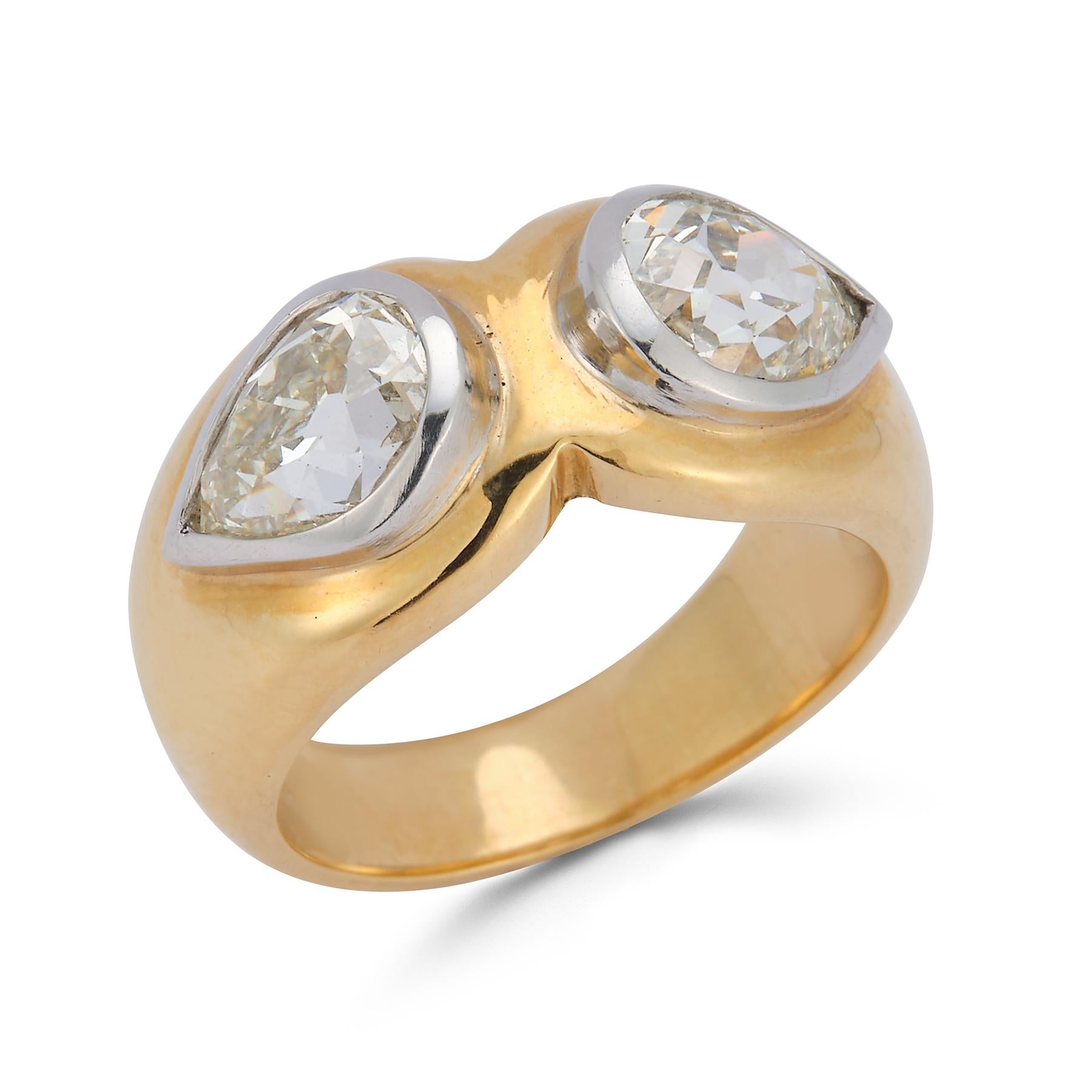 Two Pear Shape Diamond Ring

2 pear shape diamonds approximately 1.60 cts set in 18k yellow gold

Ring Size: 4.5