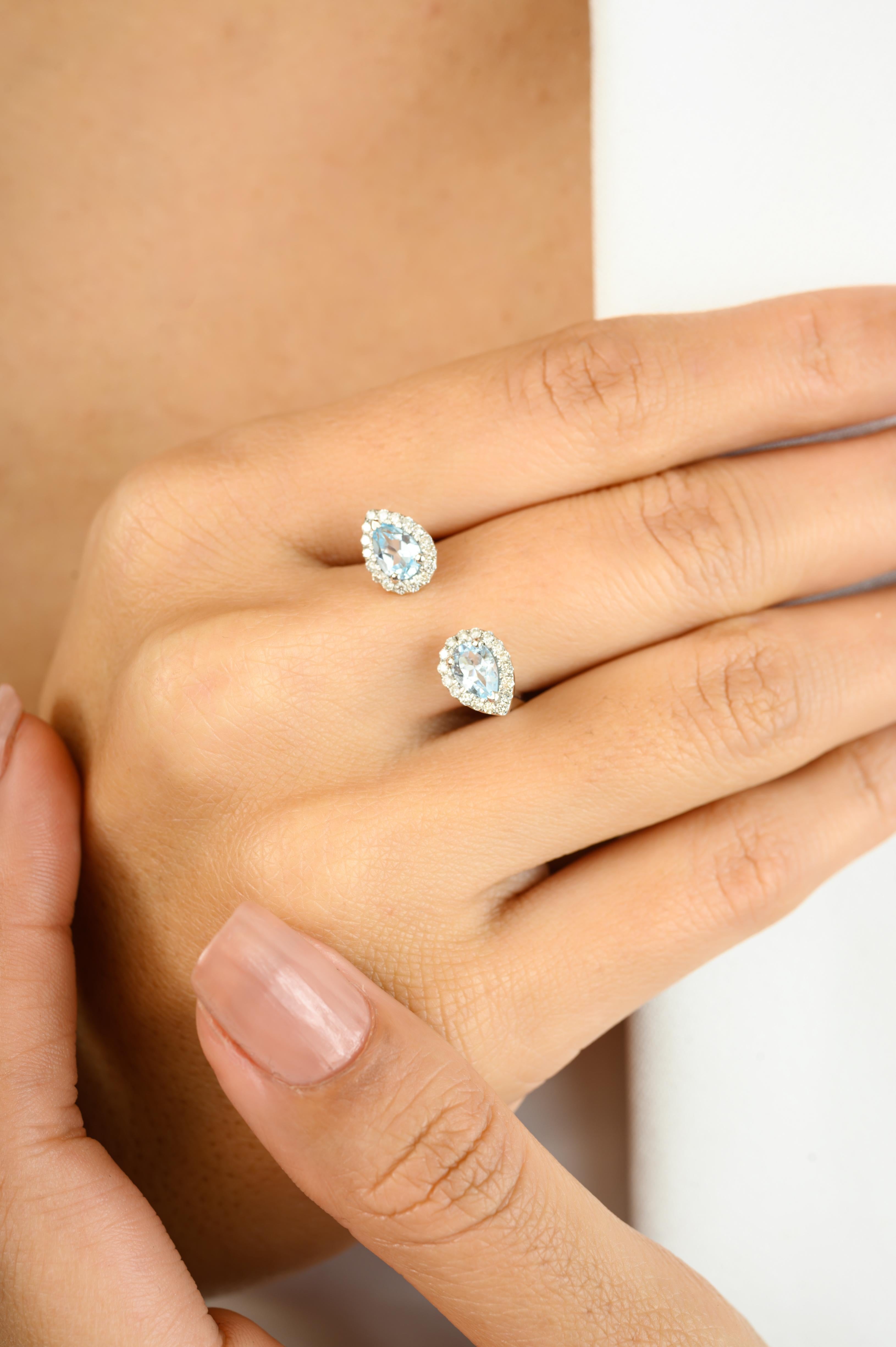For Sale:  Two Pear Shaped Blue Topaz Halo Diamond Open Ring in 14 Karat Solid White Gold 6