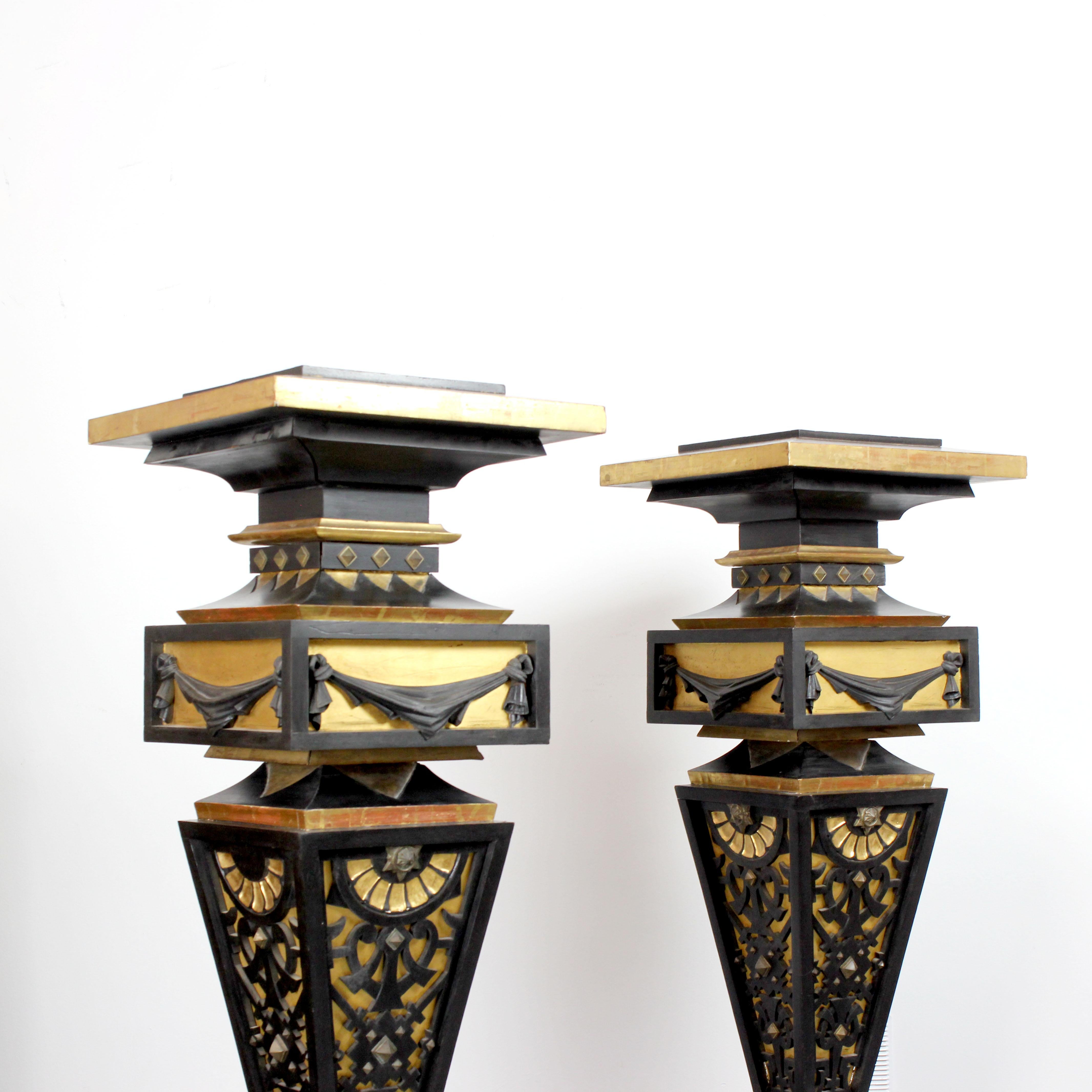 19th Century Two pedestals made of wood, gilded and painted black with details in gold bronze For Sale