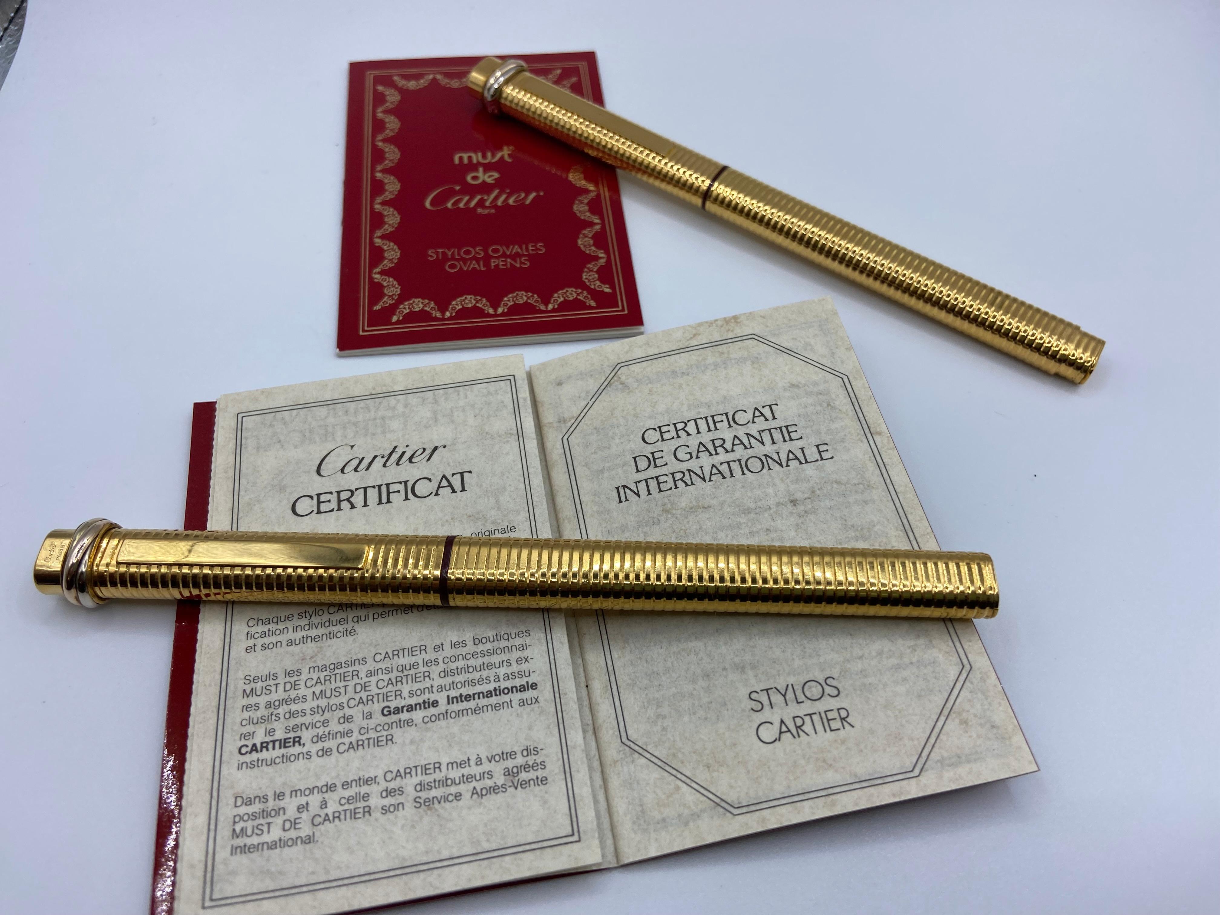 Two Pens, a Fountain Pen and a Roller, Santos by Must de Cartier, 18 Kt Gold Plated 4