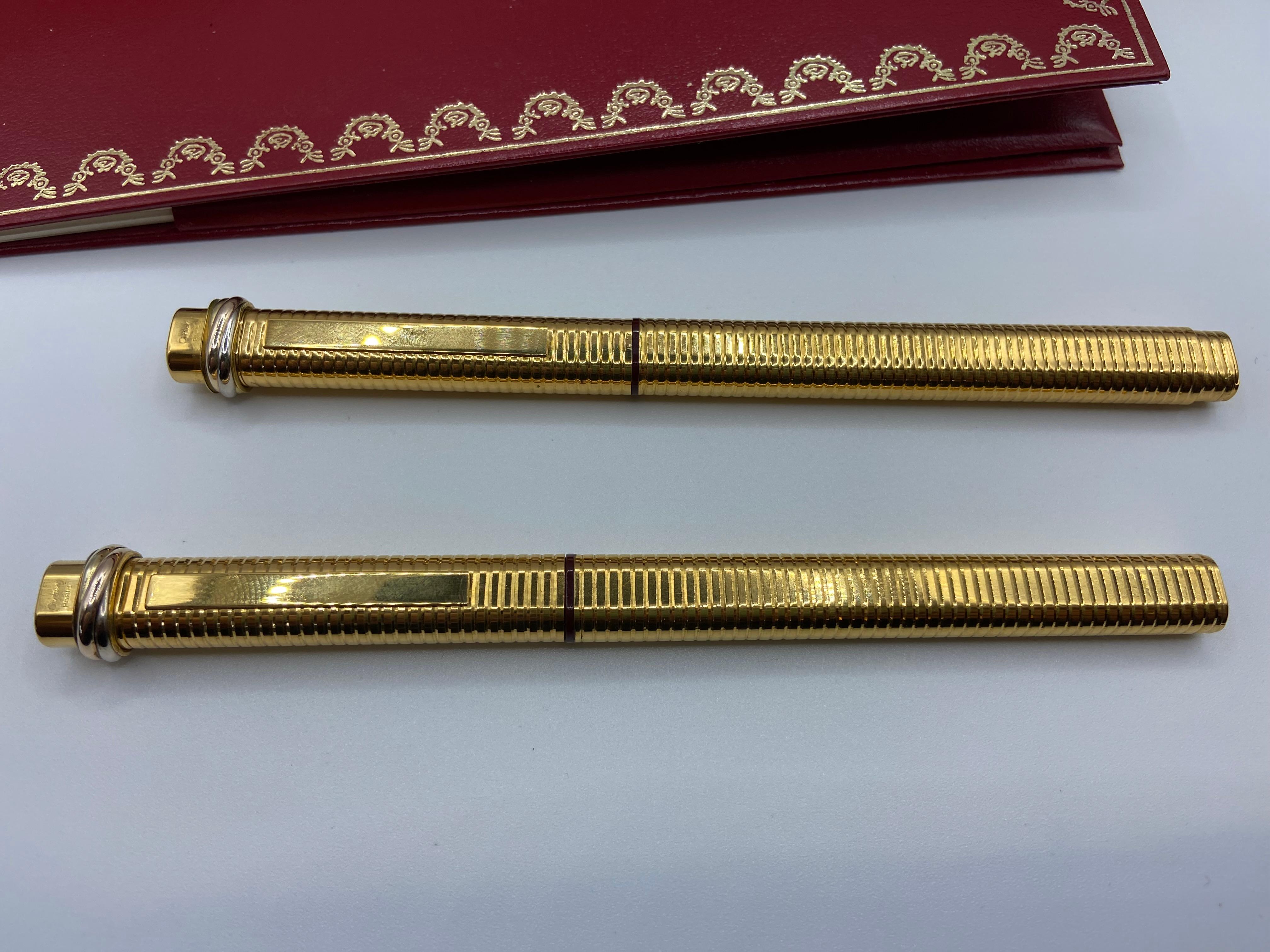Two Pens, a Fountain Pen and a Roller, Santos by Must de Cartier, 18 Kt Gold Plated 6
