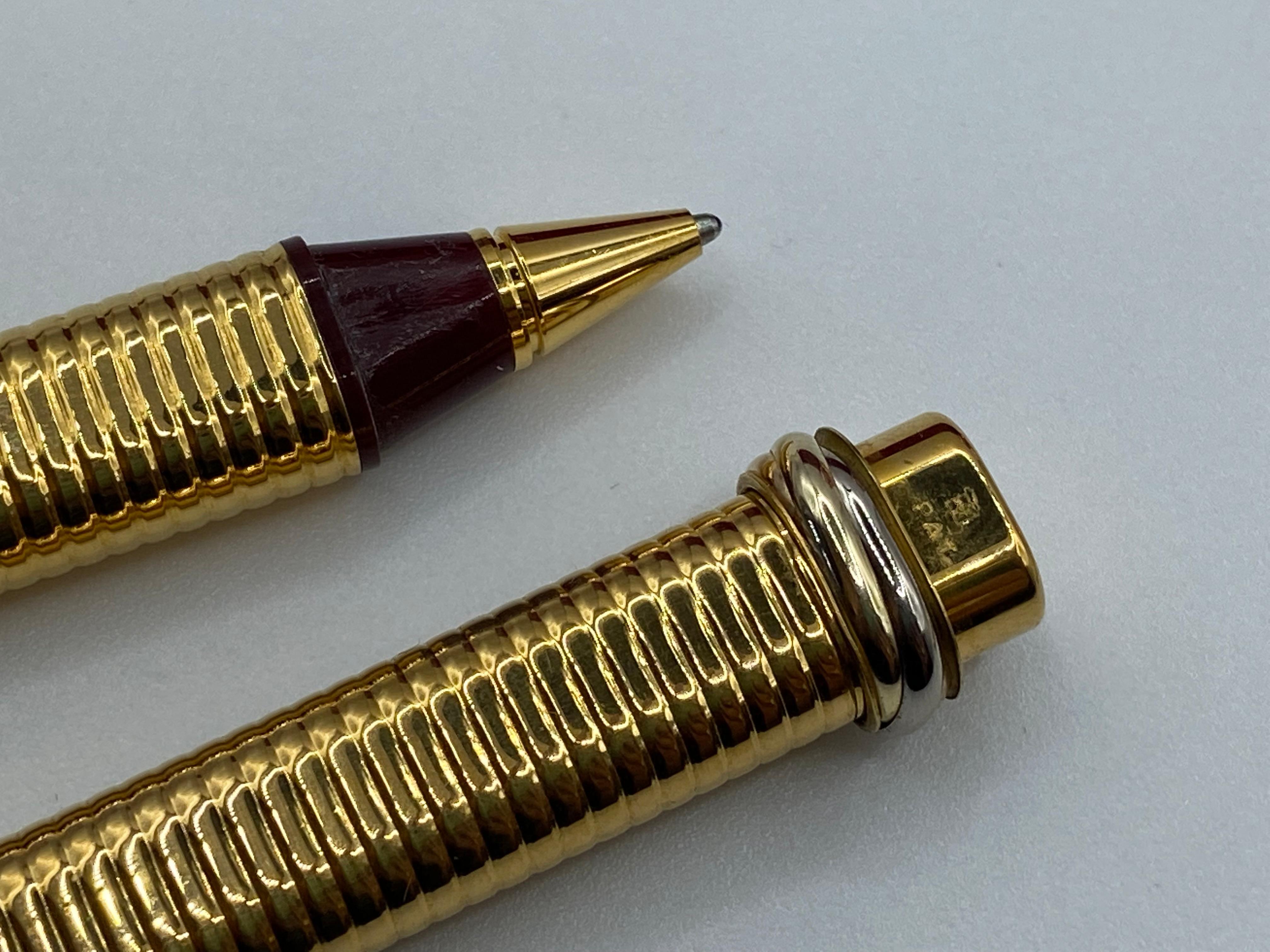 Two Pens, a Fountain Pen and a Roller, Santos by Must de Cartier, 18 Kt Gold Plated In Good Condition In Palermo, IT