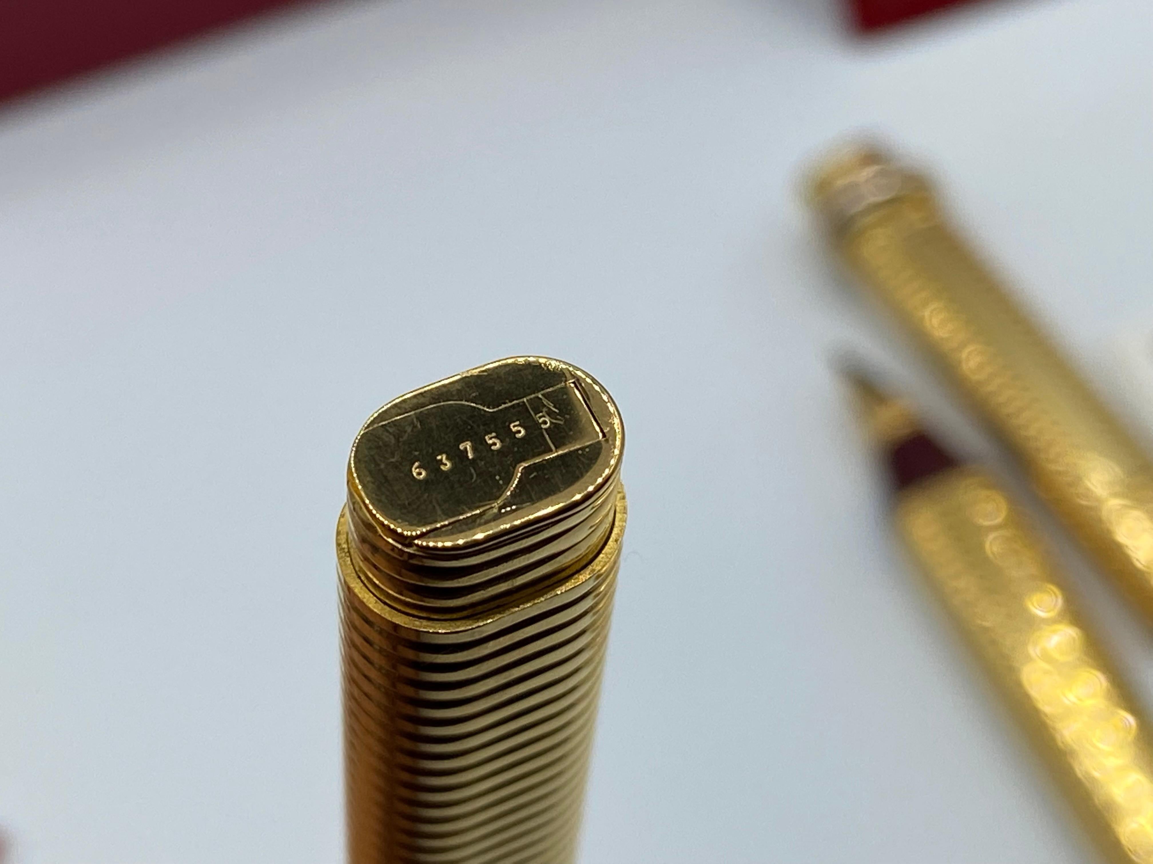 Women's or Men's Two Pens, a Fountain Pen and a Roller, Santos by Must de Cartier, 18 Kt Gold Plated
