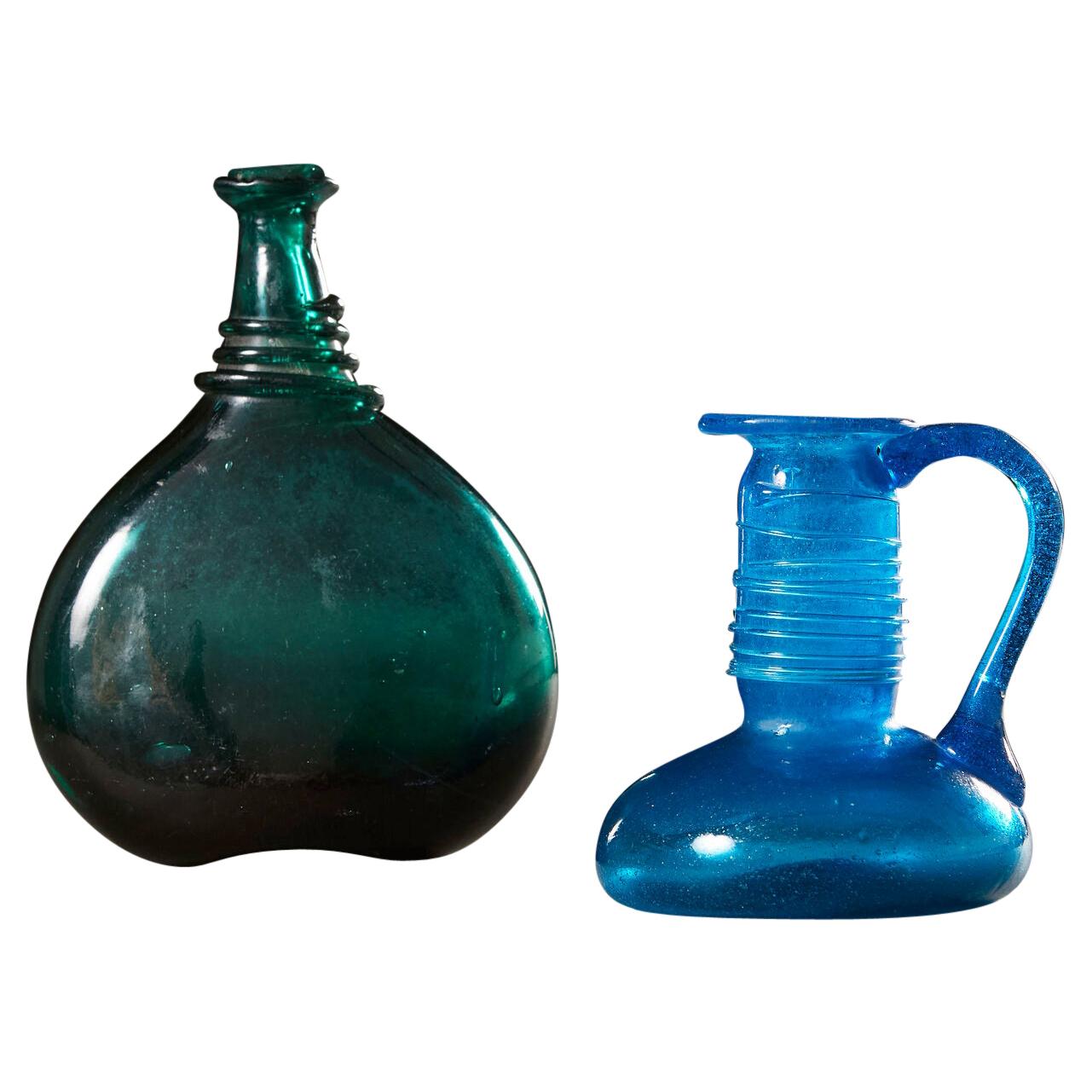 Two Persian Glass Vessels with Serpentine Coil Necks