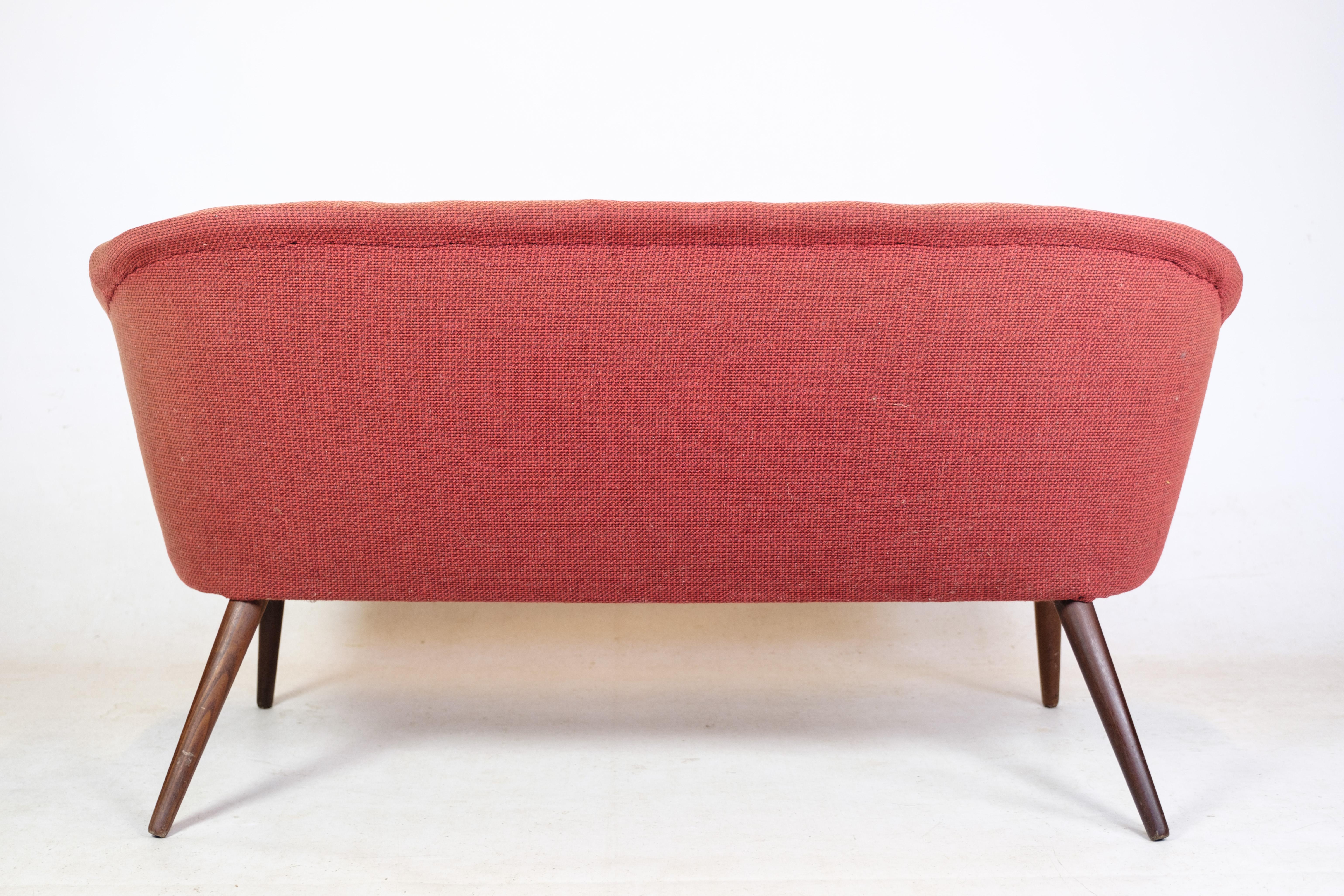 Fabric Two person Sofa Designed by Bent Møller Jepsen with teak legs and nails, 1950