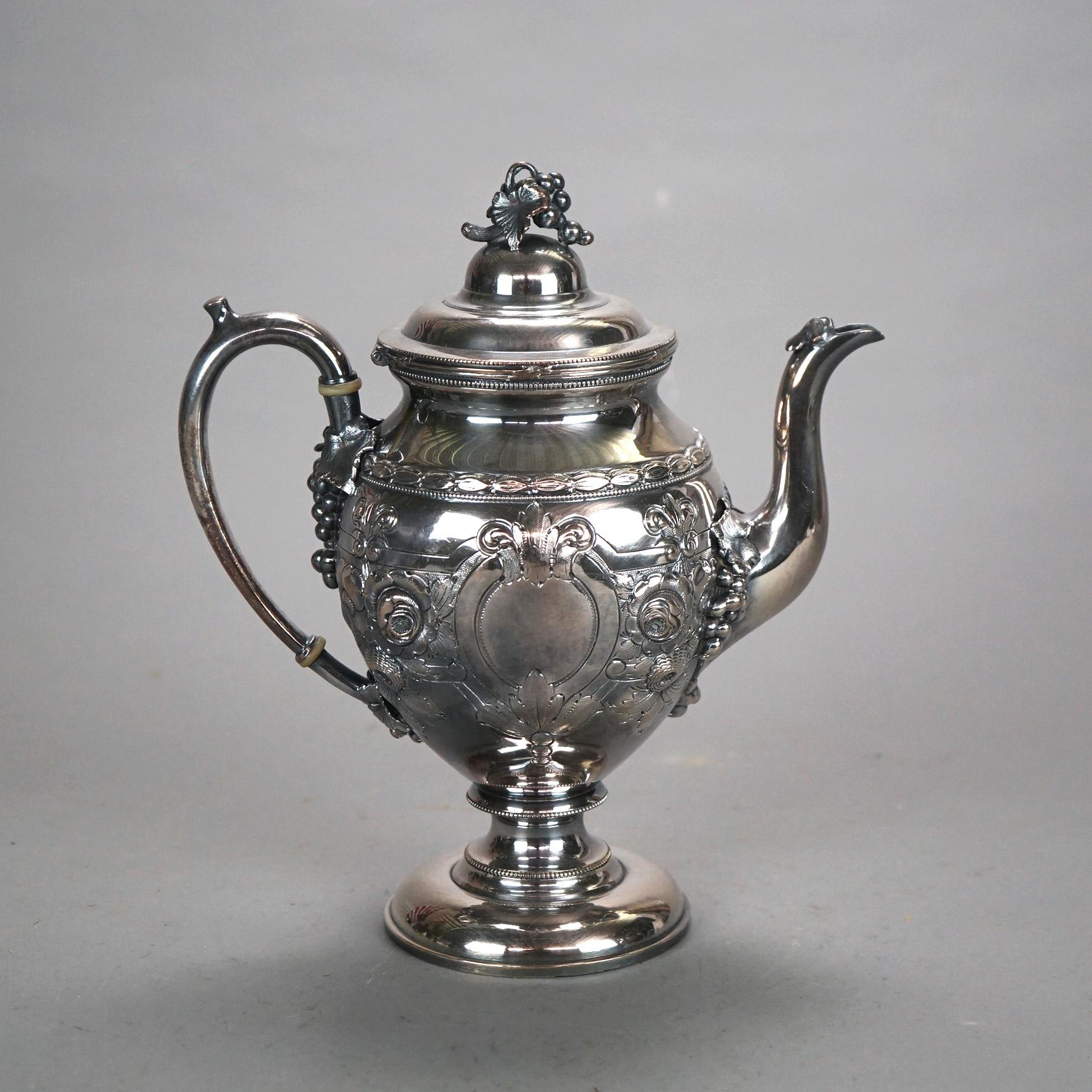 Two Piece Antique Silver Plated Tea Set with Foliate Engraving C1890

Measures - 12.25
