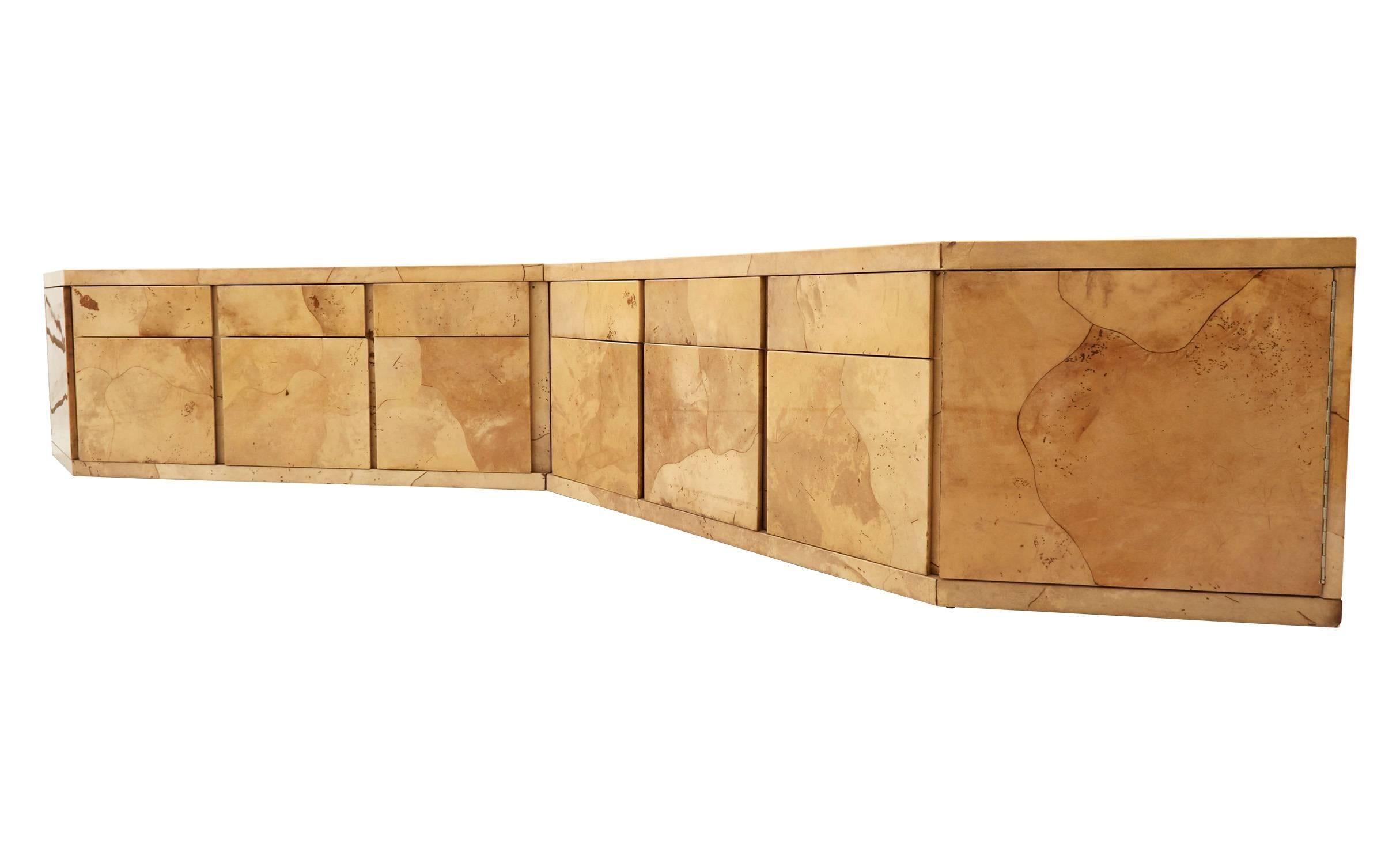 Found in Palm Beach, our Vintage Lacquered Parchment Credenza was crafted in America in the mid-20th century. This sleek sideboard is made up of two evenly-sized pieces, which can be seamlessly fit together or split apart. It’s fully clad in natural