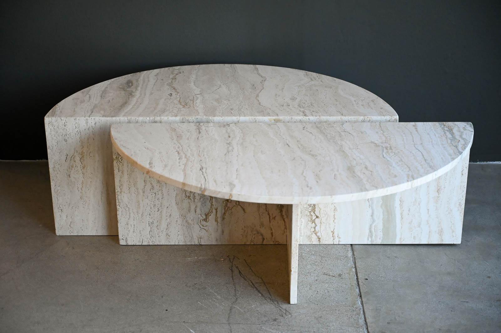 Two Piece Round Travertine Coffee Table Set by Up & Up, ca. 1970 in the style of Angelo Mangiarotti.  Beautiful two piece Italian travertine and two identical pieces that can be pushed together or separated and staggered for a more interesting