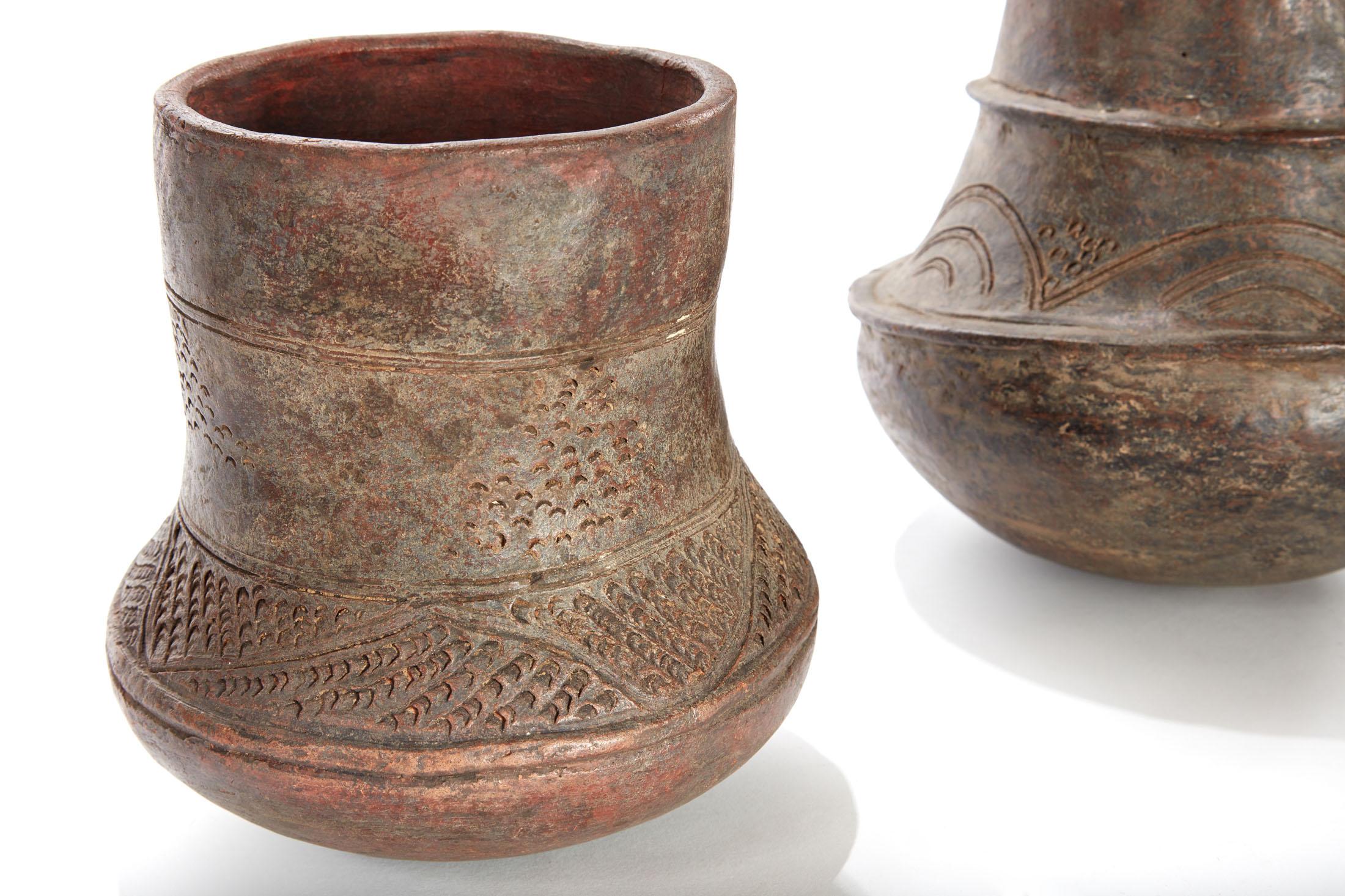 Hand-Carved Two Pieces of a Pair of Early 20th Century Etched African Vessels from Mali