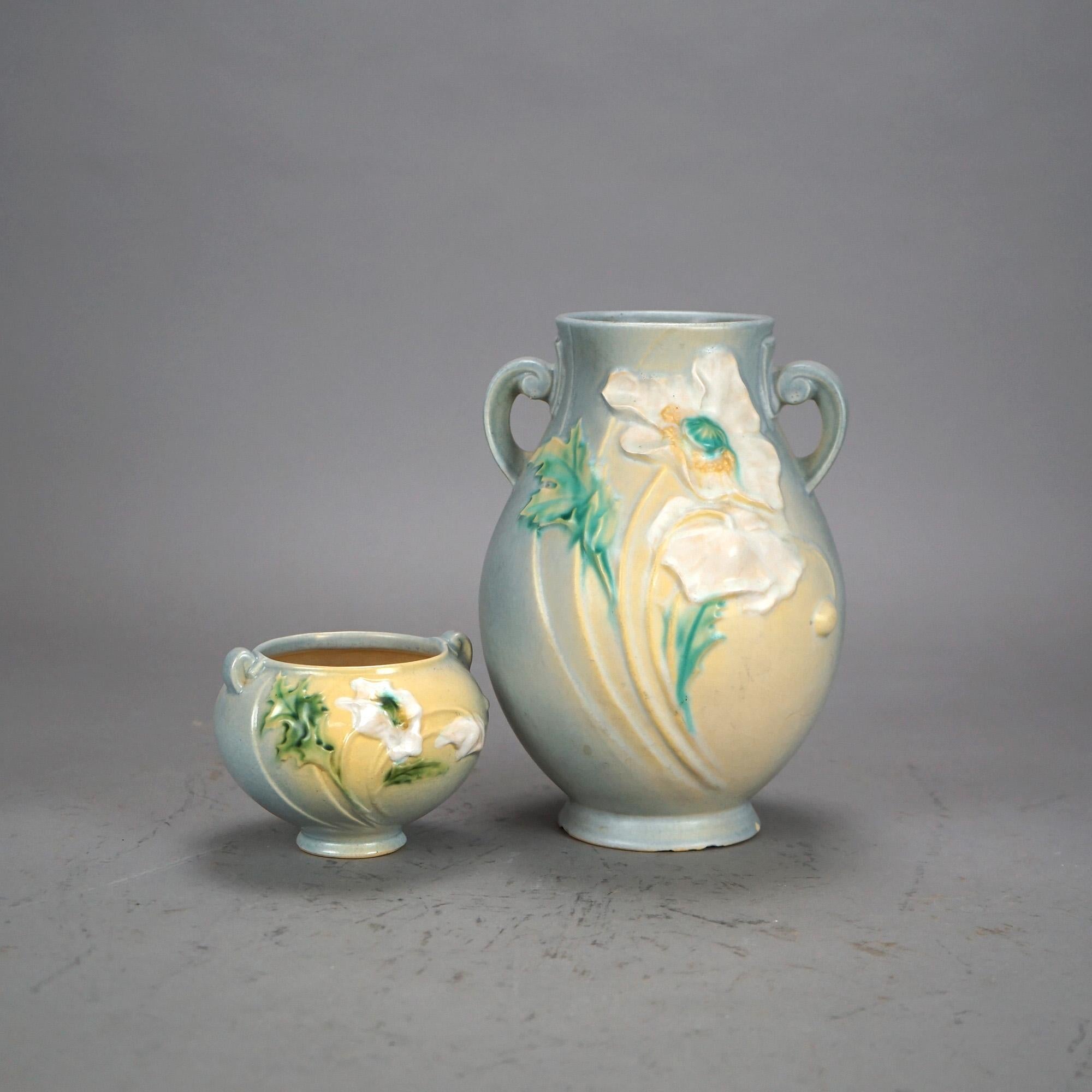Two Pieces of Soft Blue Roseville Art Pottery in Poppy Pattern Mid 20th

Measures - Small pot 3 5/8