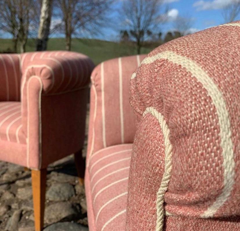 Two pink beautys.. Lounge chairs from the 1950s upholstered in stribed pink/white wool (not original), legs in oak. 

Very good condition with a great comfort.

