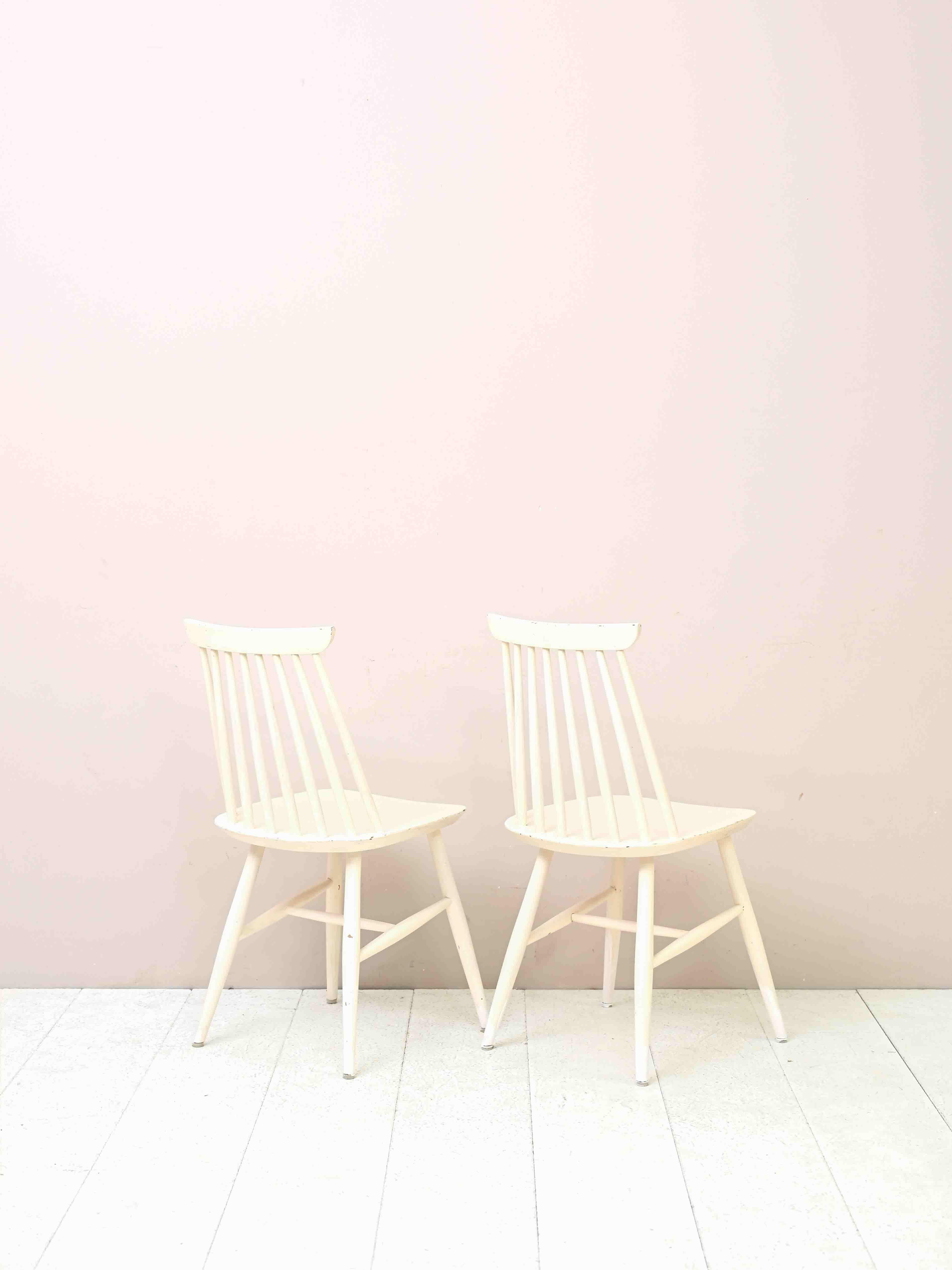 Scandinavian Two 'Pinstolar' Chairs Made of Wood Painted White For Sale