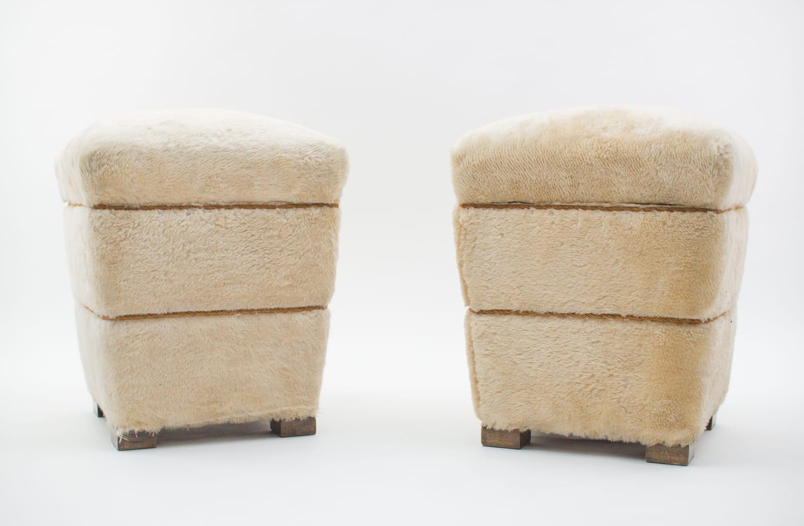 Two plush stools with storage, 1950s France

Very decorative. Very fluffy. With storage space. In one there is a water stain in the storage space, see photos. 

The stools do not smell, are clean and ready to live in immediately. 

We are