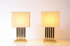 Two polished 1970's brass table lamps