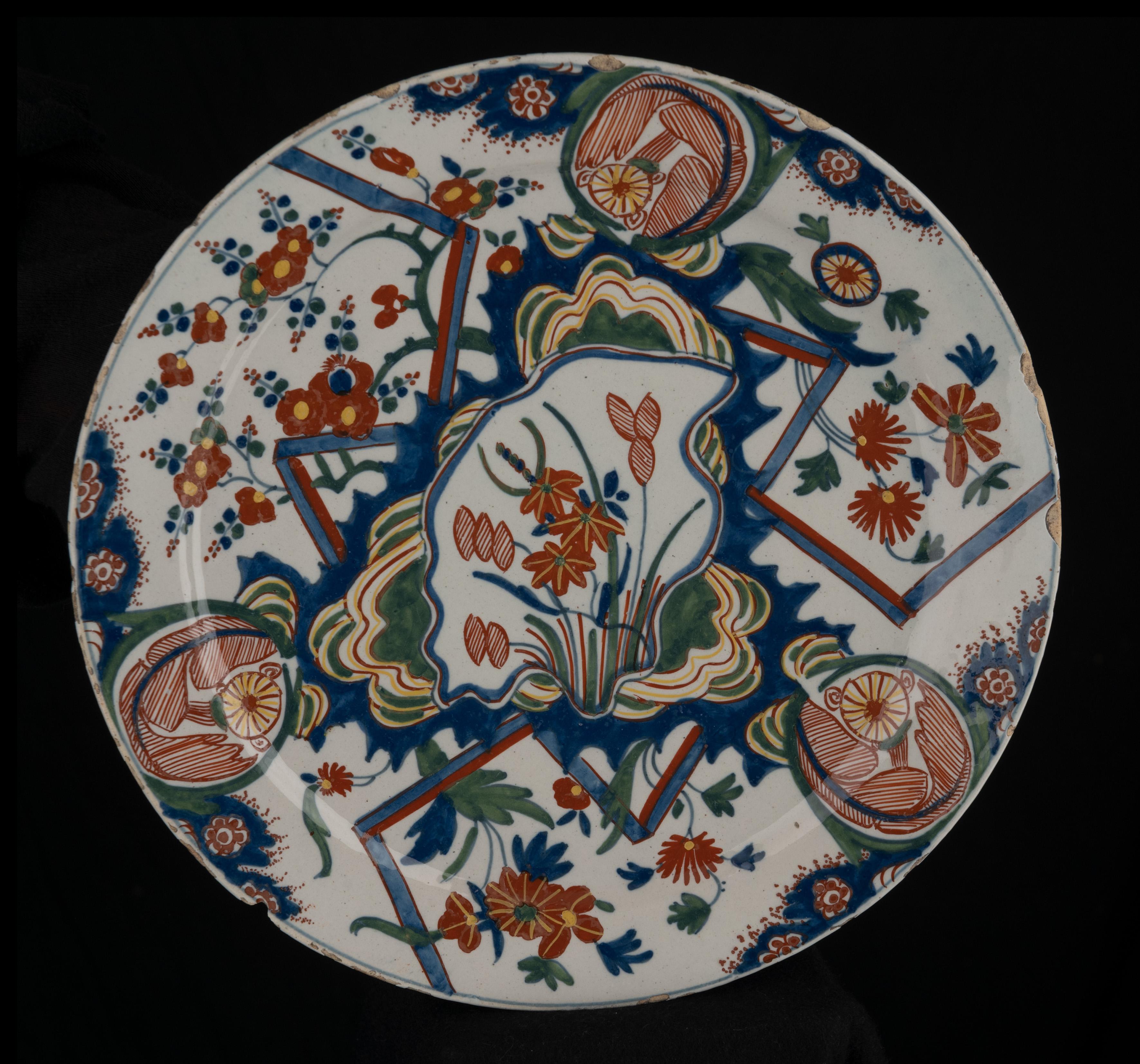 Baroque Two polychrome lightning plates Delft, 1700-1730 The Peacock pottery For Sale