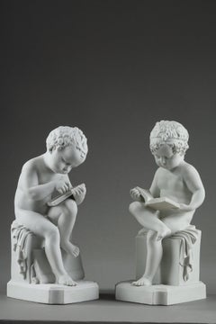 Two porcelain biscuit figurines of The Child Reading and The Child Drawing