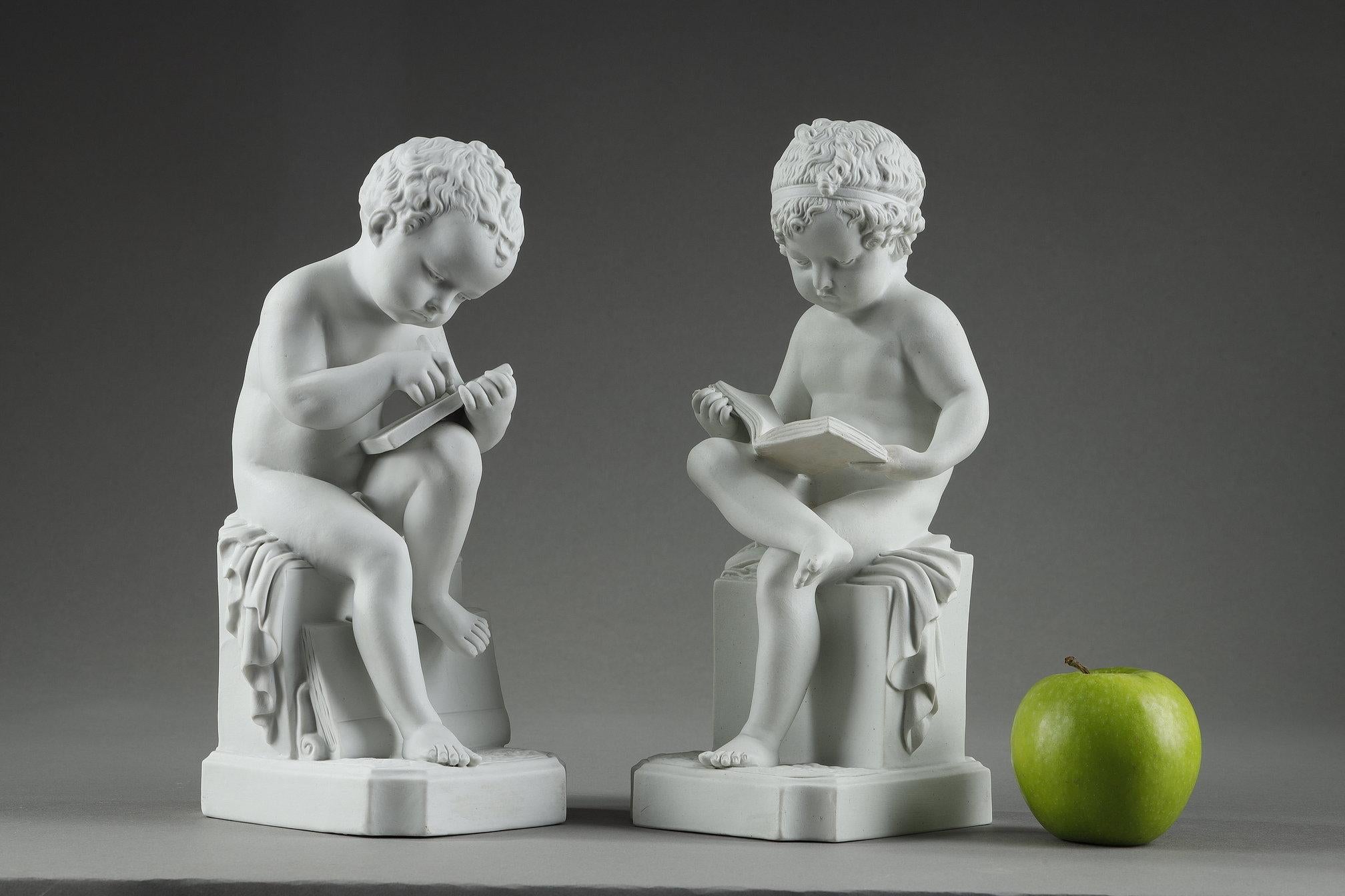Early 20th Century Two porcelain biscuit figurines of The Child Reading and The Child Drawing For Sale