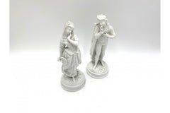 Two Porcelain Bisque Figurines