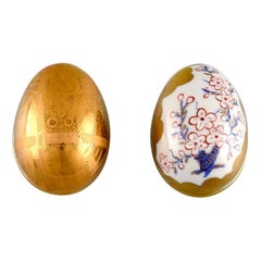 Two Porcelain Easter Eggs with Hand-Painted Flowers and Gold Decoration