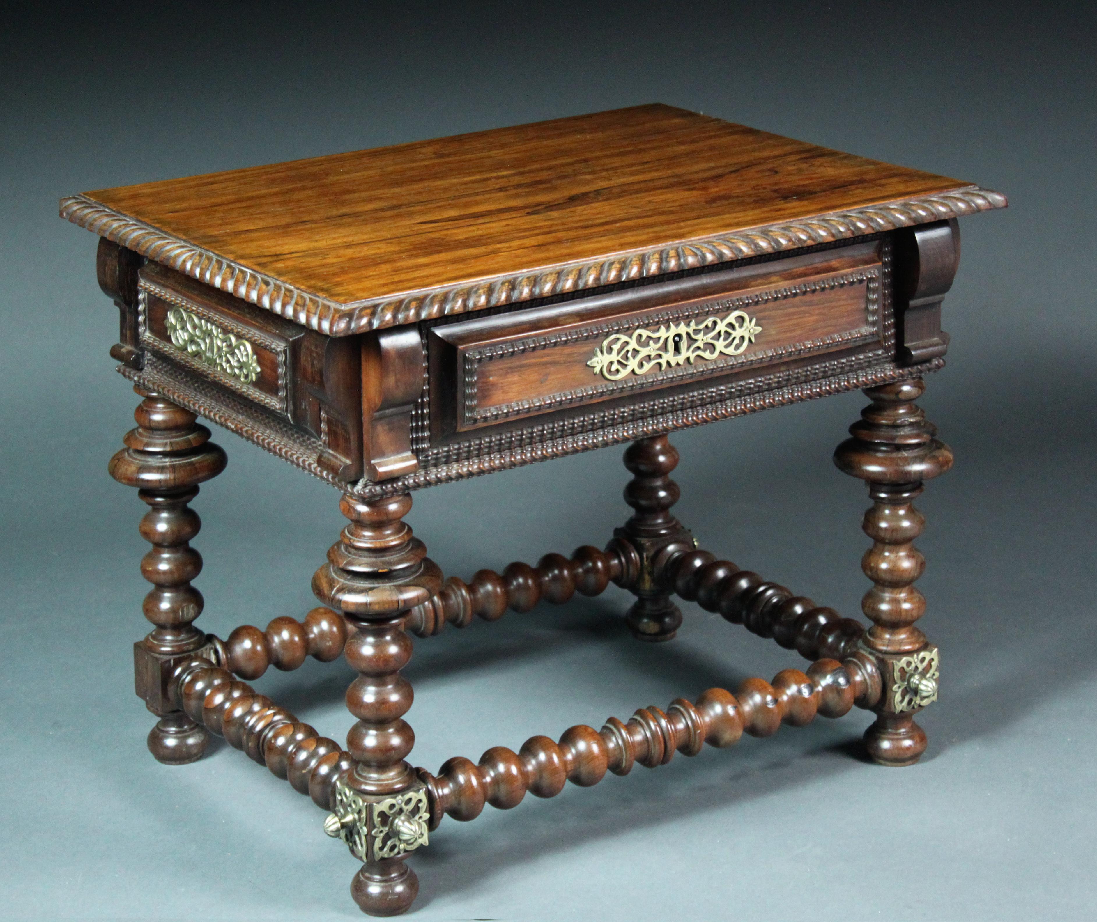 Two attractive Portuguese brass-mounted rosewood low tables: similar tables are advertised widely by auctioneers and dealers with dates varying from the late 17th-late 19th century. My feeling is our tables were made in the first half of the 19th