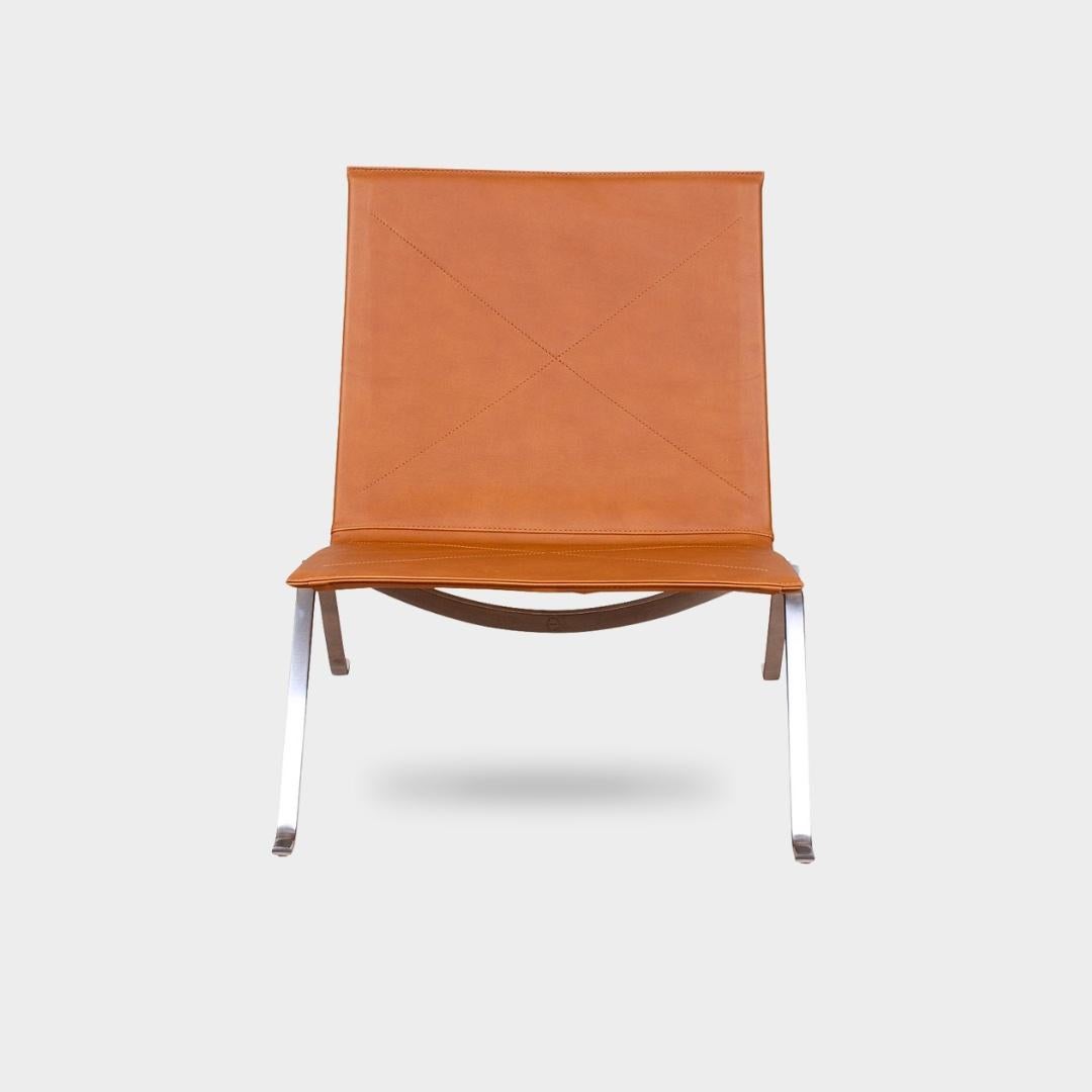 *Sold as a pair or individually*


Designer: Poul Kjærholm

Manufacturer: Kold Christensen (Discontinued model, now produced by Fritz Hansen)

Model: PK-22

Dimensions:

Height: 80 cm
Width: 60 cm
Depth: 60 cm
Seat Height: 27 cm
Material: Cognac