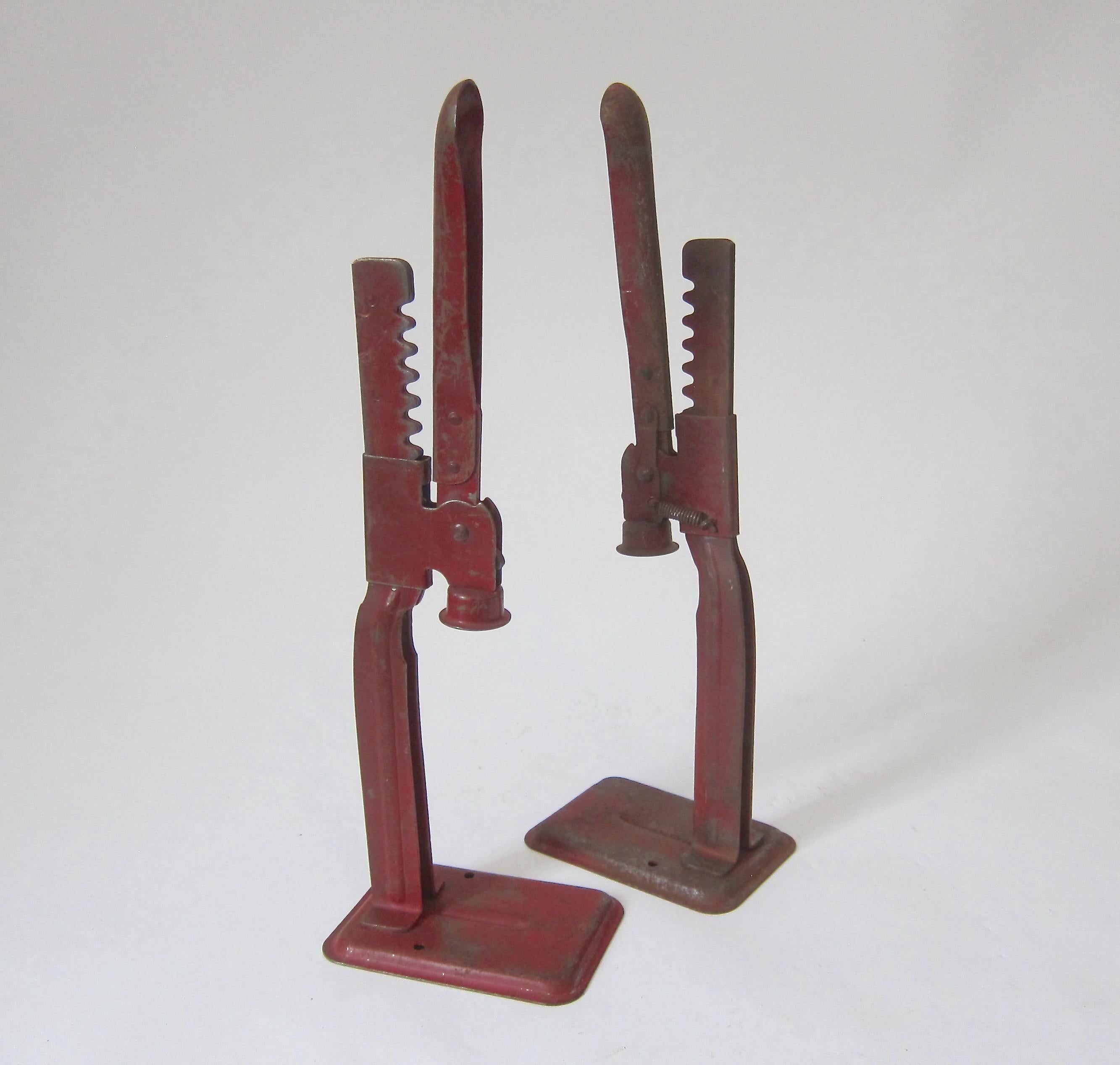 Two bottle capping tools in painted red metal dating to the Prohibition Era in America. The Industrial Design, called Climax, was patented in the late 1920s by Harry J. Lebherz for the Everedy Company of Frederick, Maryland. These devices enjoyed a