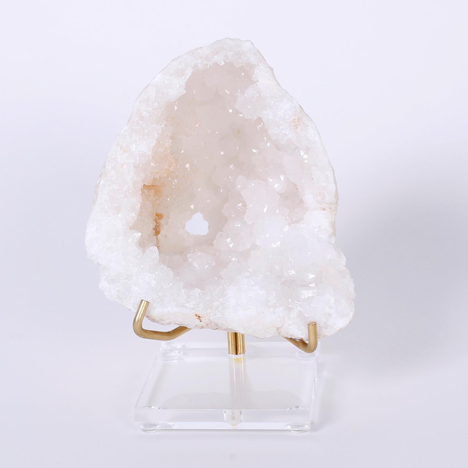 Quartz geode split into two specimens presented on Lucite and brass
stands to enhance the alluring geological spectacle.
Priced individually.

Dimensions:
Left: H: 8 W: 5.5 D: 5 $495.00
Right: H: 6.5 W: 5.5 D: 5 $435.00.