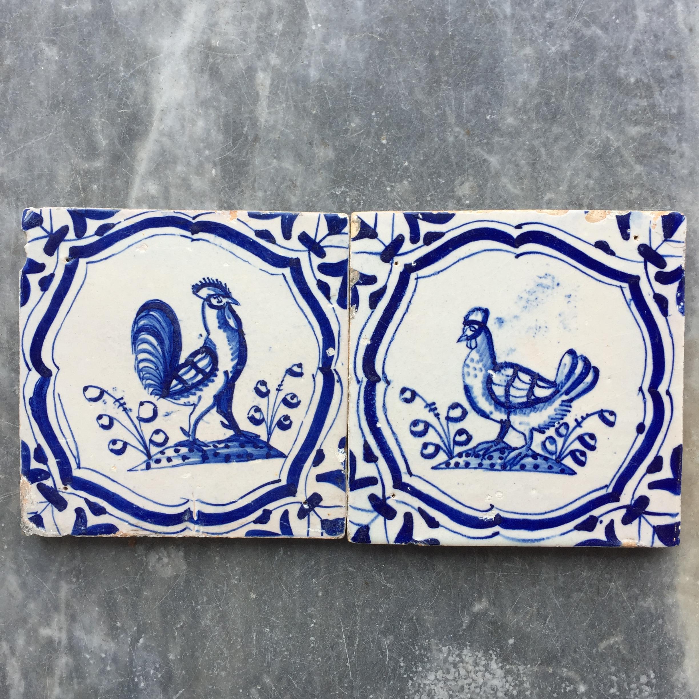 The Netherlands
Rotterdam
Circa 1625 - 1650

A nice set of two Dutch tiles with fine decoration of a tough rooster and a chicken between two plants.
Painted within an accolade border and with a superb clear glaze.

A genuine collectible of