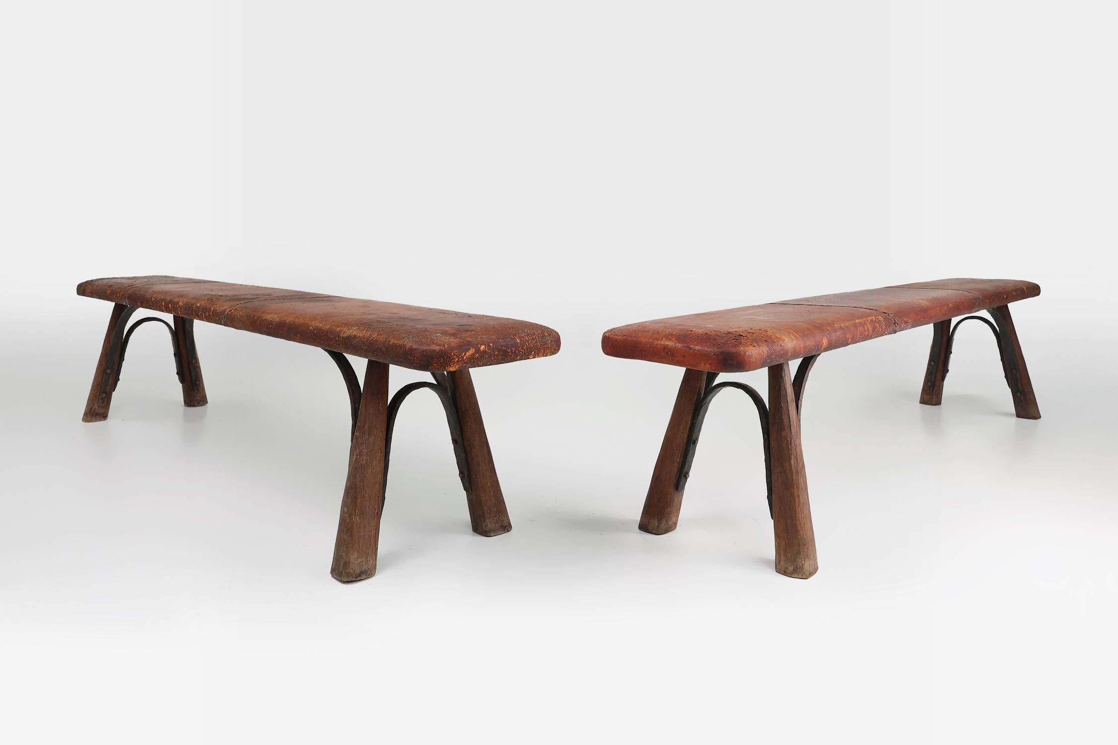 Hand-Carved Two rare industrial gym benches in oak and wrought iron with leather top