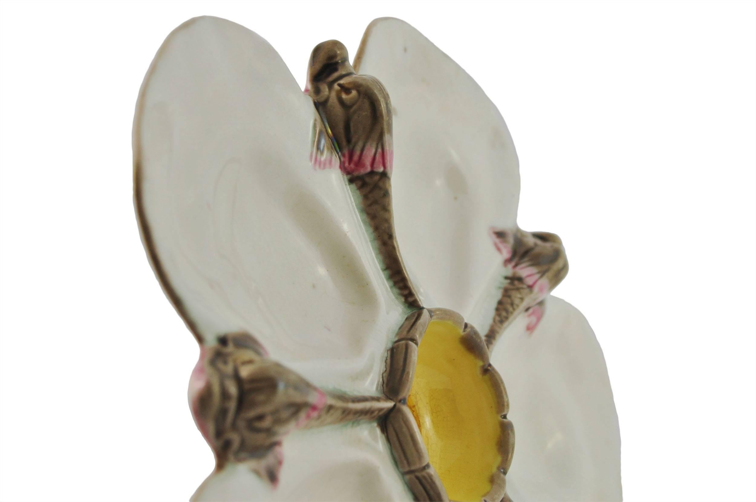 Pair Rare Wedgwood Majolica argenta ware oyster plates, each naturalistically molded with a central well glazed in yellow within five oyster shell-form pockets separated by dolphins glazed in shades of gray and pink, impressed Wedgwood, with date