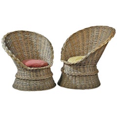 Due poltrone in rattan, 1960 circa