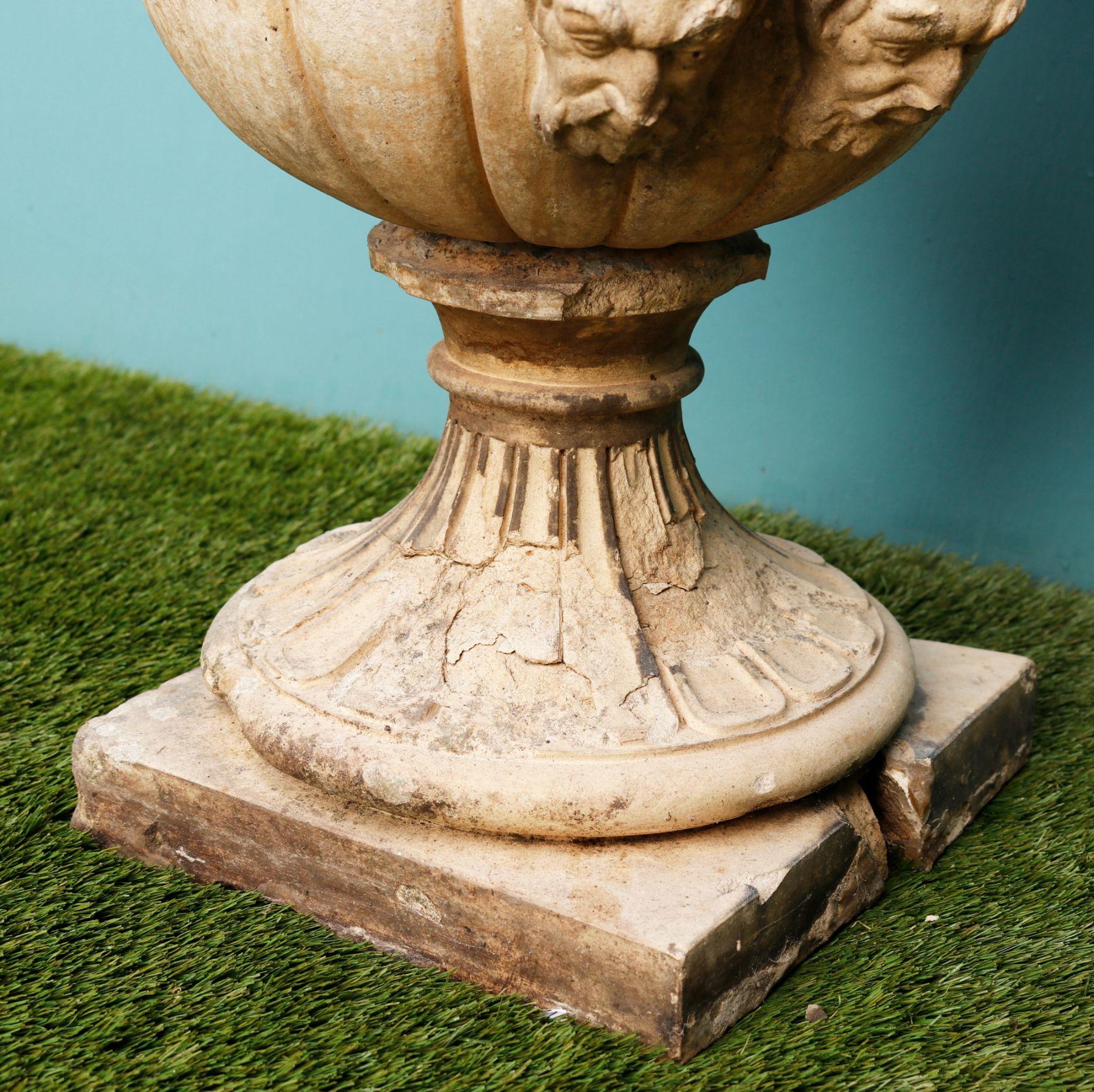 Two late 19th century antique buff terracotta garden urns manufactured by Blanchard. These urns are over 130 years old and despite signs of wear and losses, remain a striking set for a garden, telling the story of 19th century English craftsmanship.