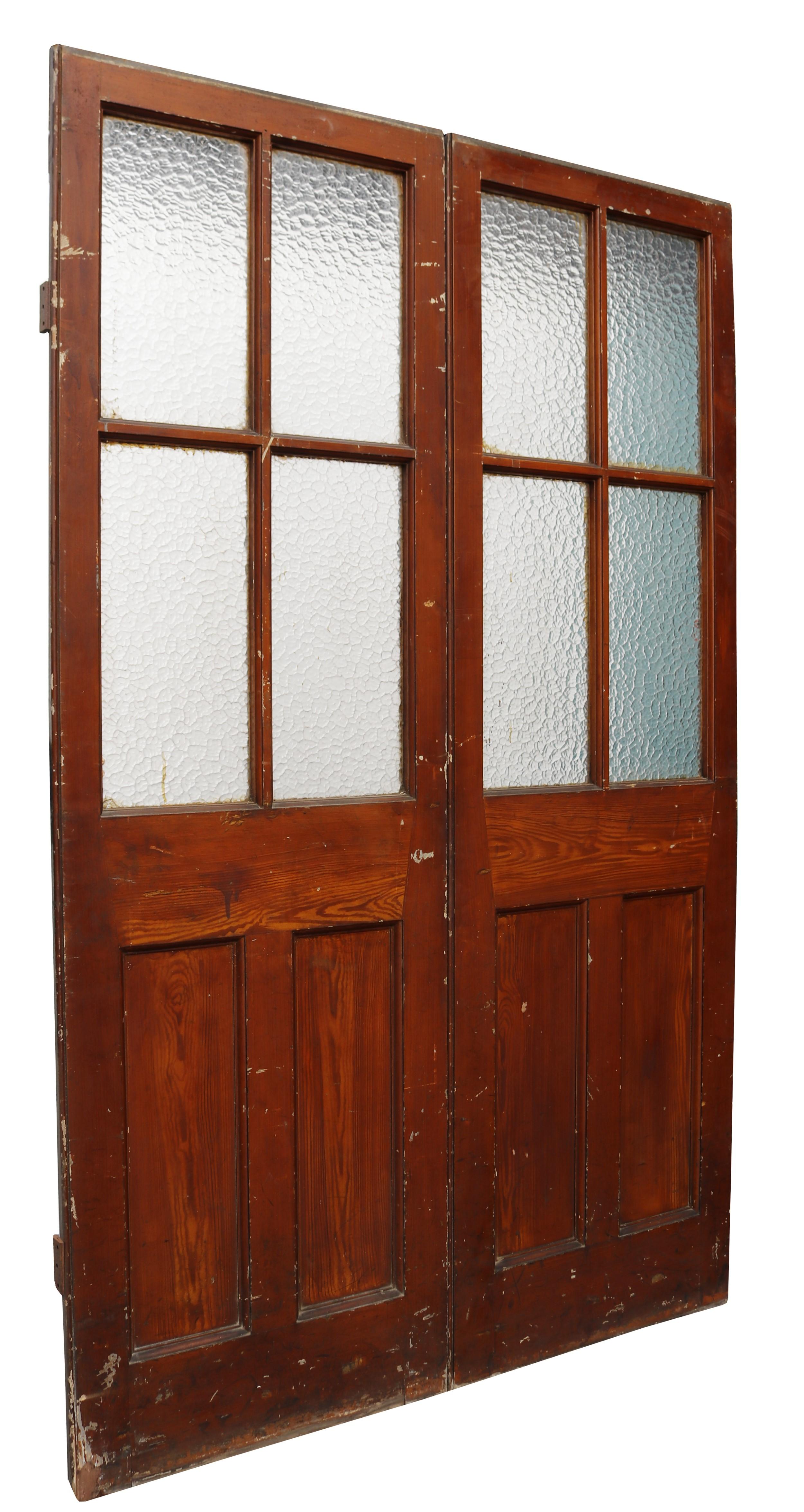 A set of pine double doors with textured glass panels.

One side has original paint finish.

Suitable for internal use.