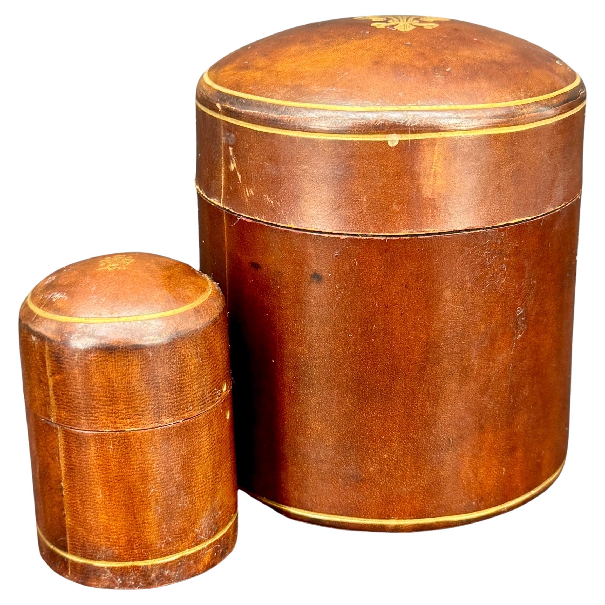 Mid-Century Modern Two Round Florentine Mid Century Leather Boxes with Fleur-de-Lis Decoration For Sale