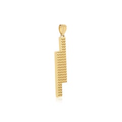 Ciondolo in oro 18 carati con diamante da 1 carato a forma di baguette su due file.