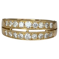 Anello a fascia con due file di diamanti in giallo 18 K. Oro