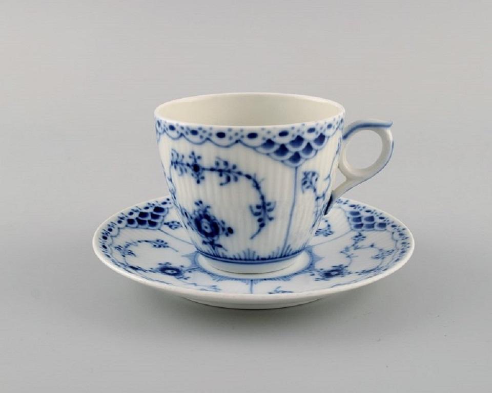 Two Royal Copenhagen Blue Fluted Half Lace coffee cups with saucers. 
Model number 1/756.
The cup measures: 7.7 x 6.5 cm.
Saucer diameter: 13.3 cm.
In excellent condition.
Stamped.
2nd factory quality.