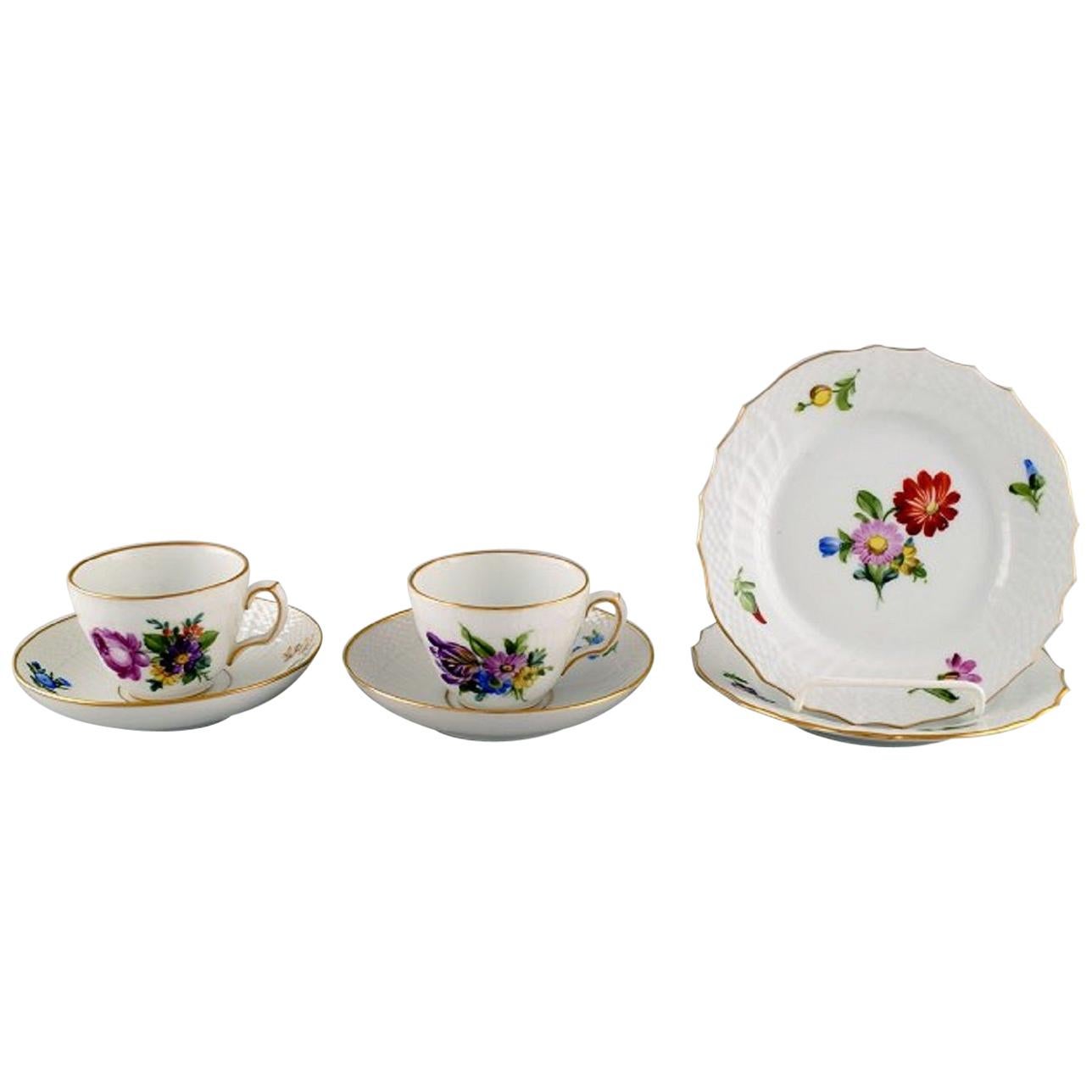 Two Royal Copenhagen Saxon Flower Coffee Cups with Saucers and Two Plates