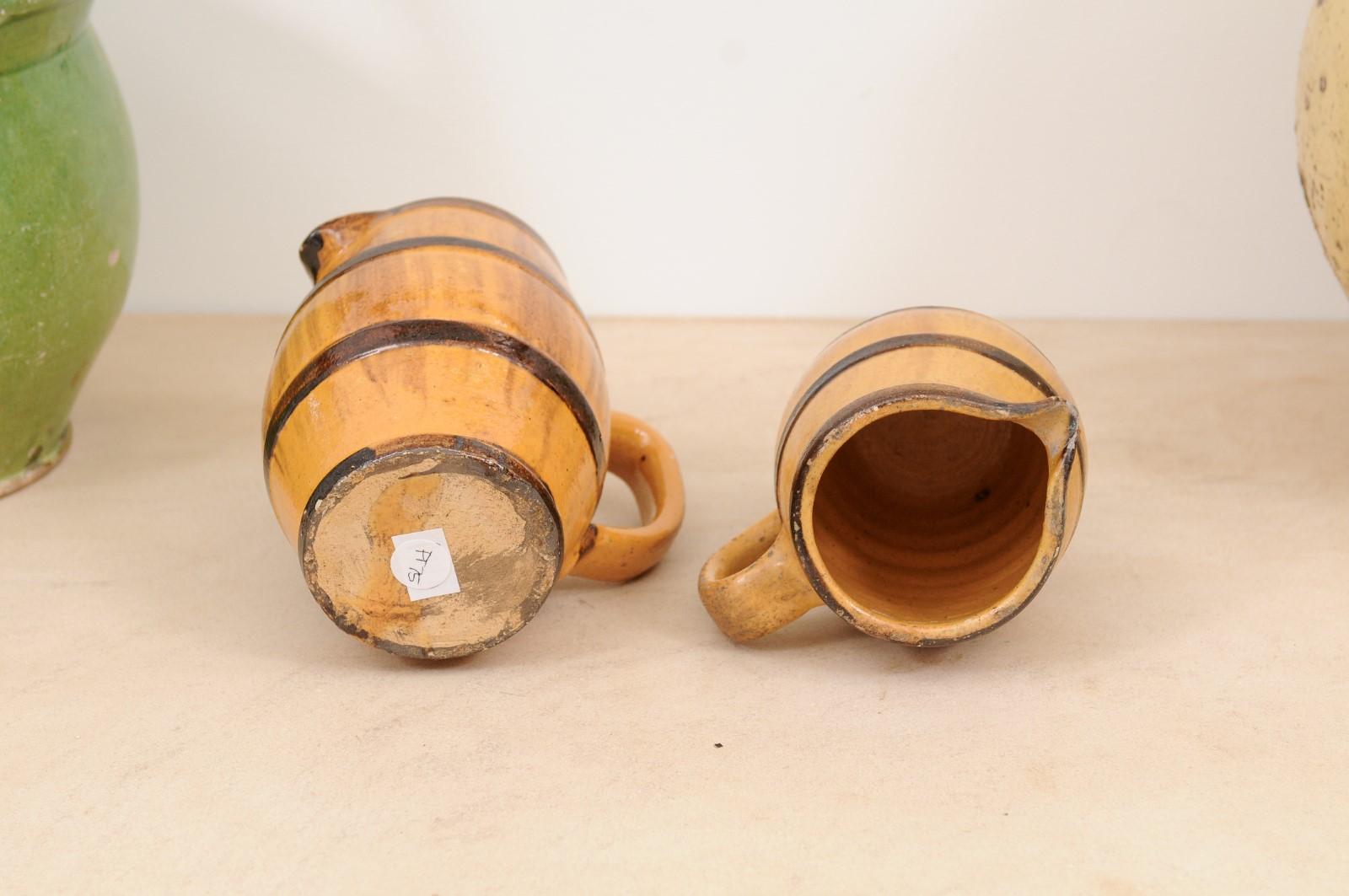 Two Rustic French 19th Century Pottery Pitchers with Yellow and Brown Glaze For Sale 5