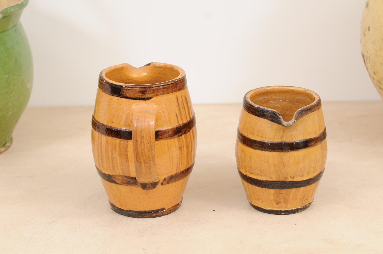 Two Rustic French 19th Century Pottery Pitchers with Yellow and Brown Glaze In Good Condition For Sale In Atlanta, GA